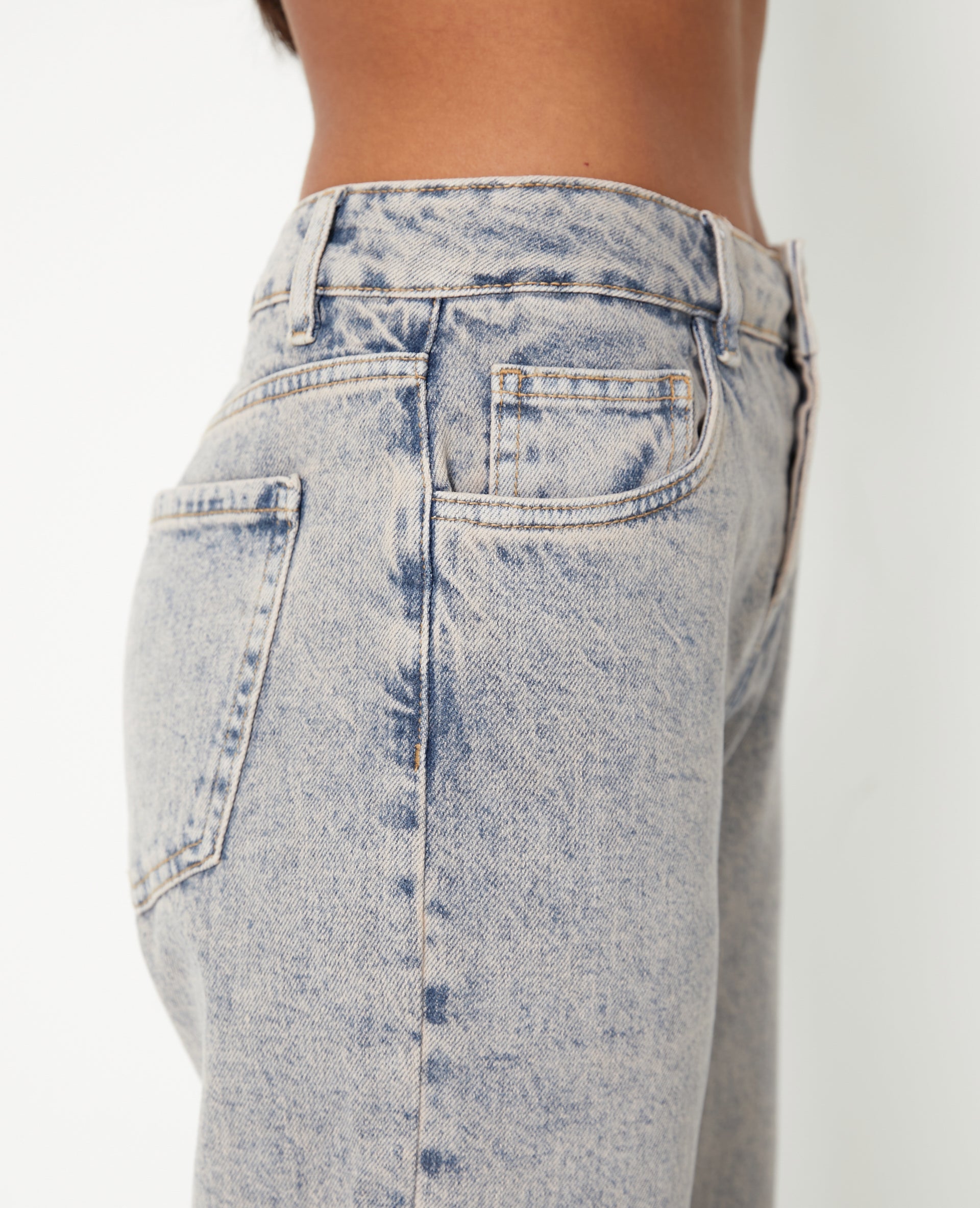 Jean wide taille basse effet délavé