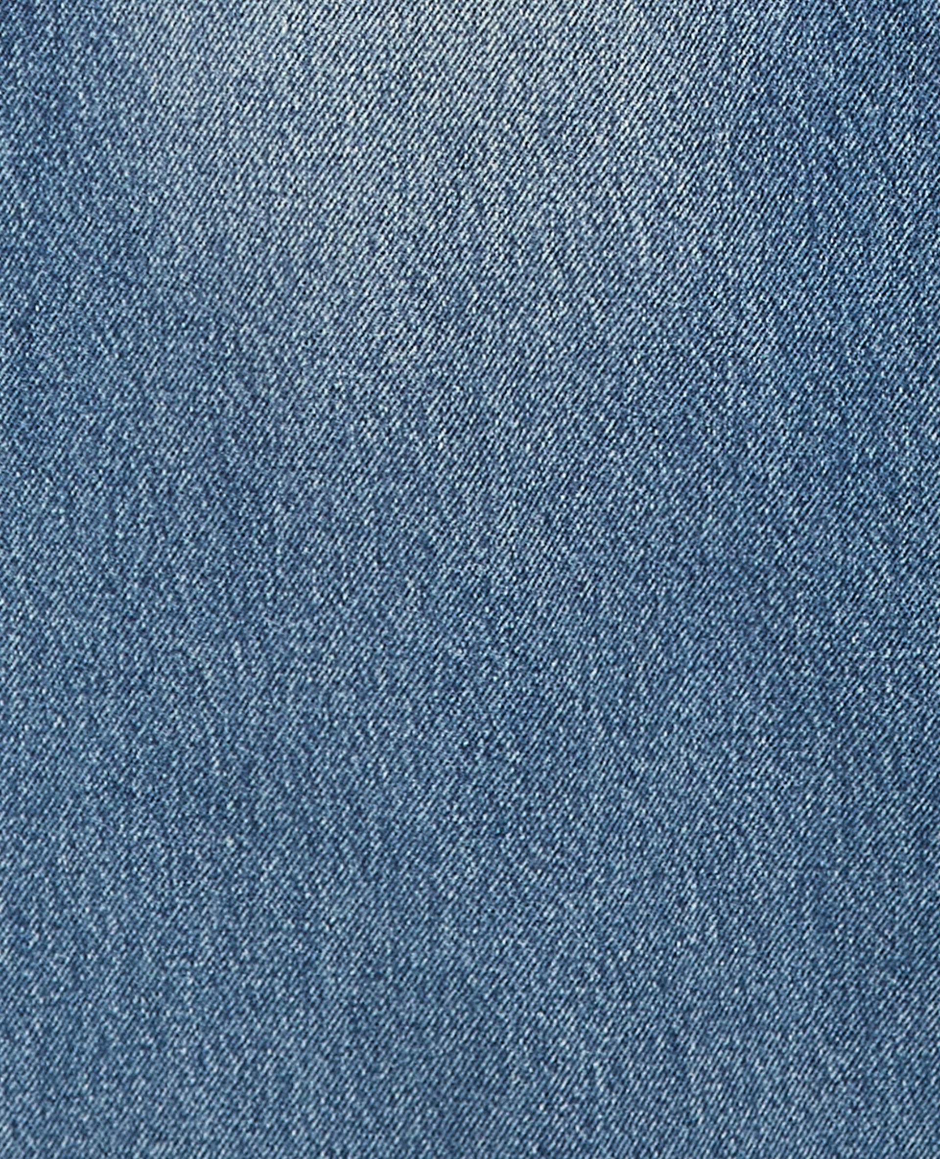 Jean baggy taille basse avec ceinture à nouer