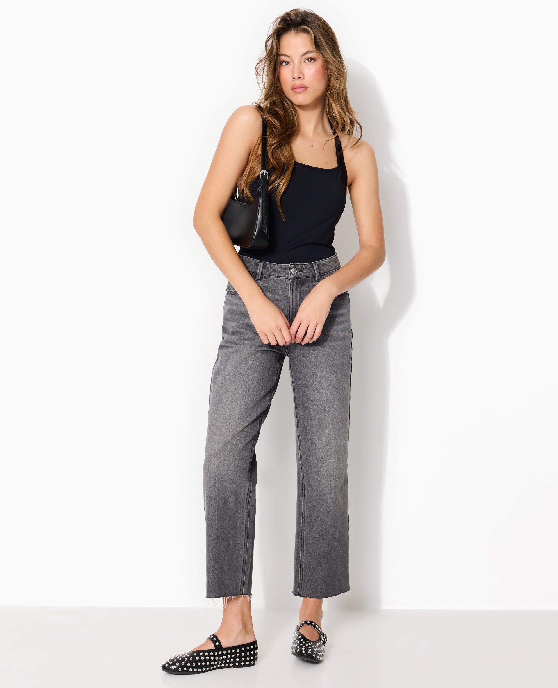 Jean straight taille haute avec bas coupés
