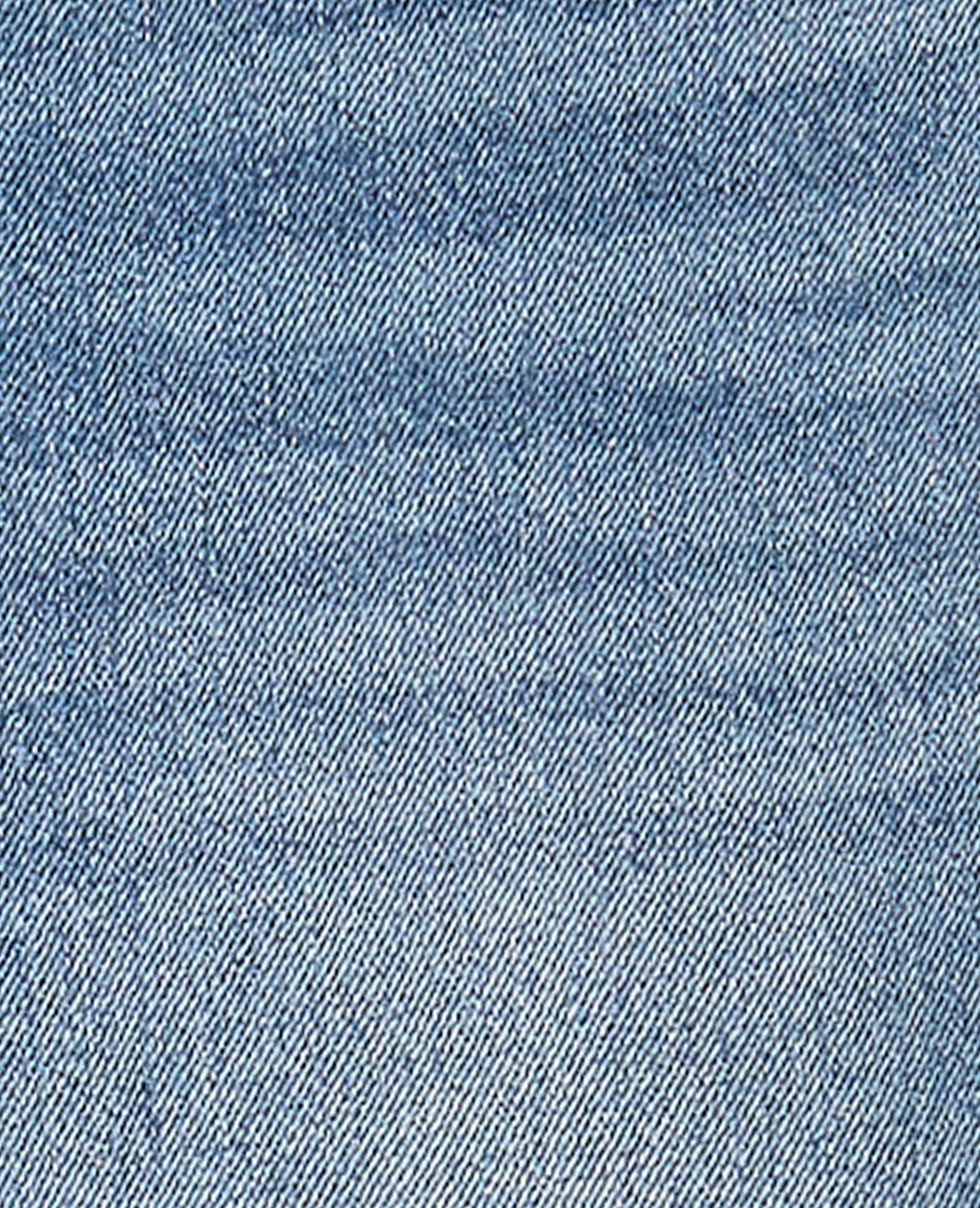 Bermuda large en jean taille basse bas coupés