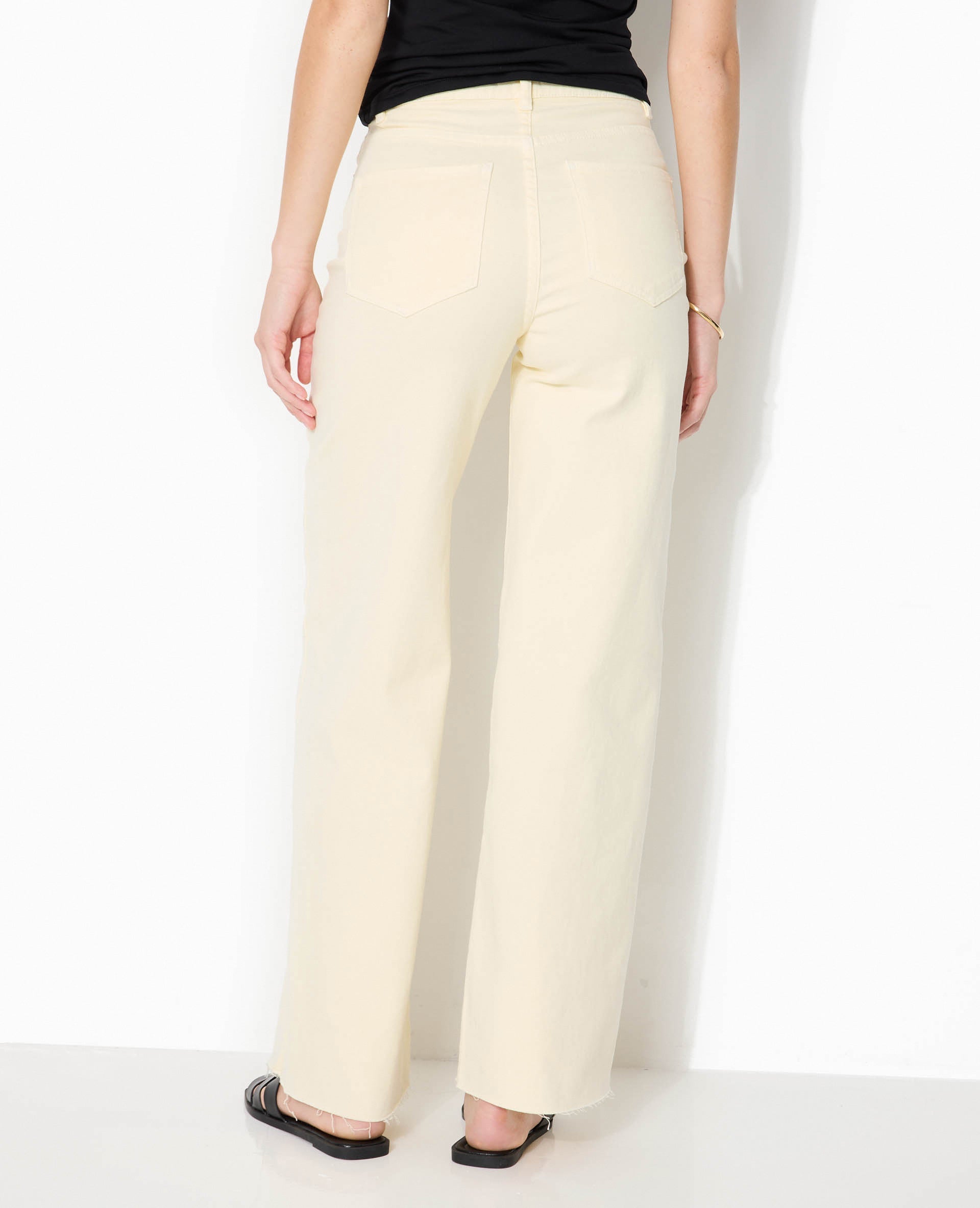 Jean wide taille haute avec bas coupés