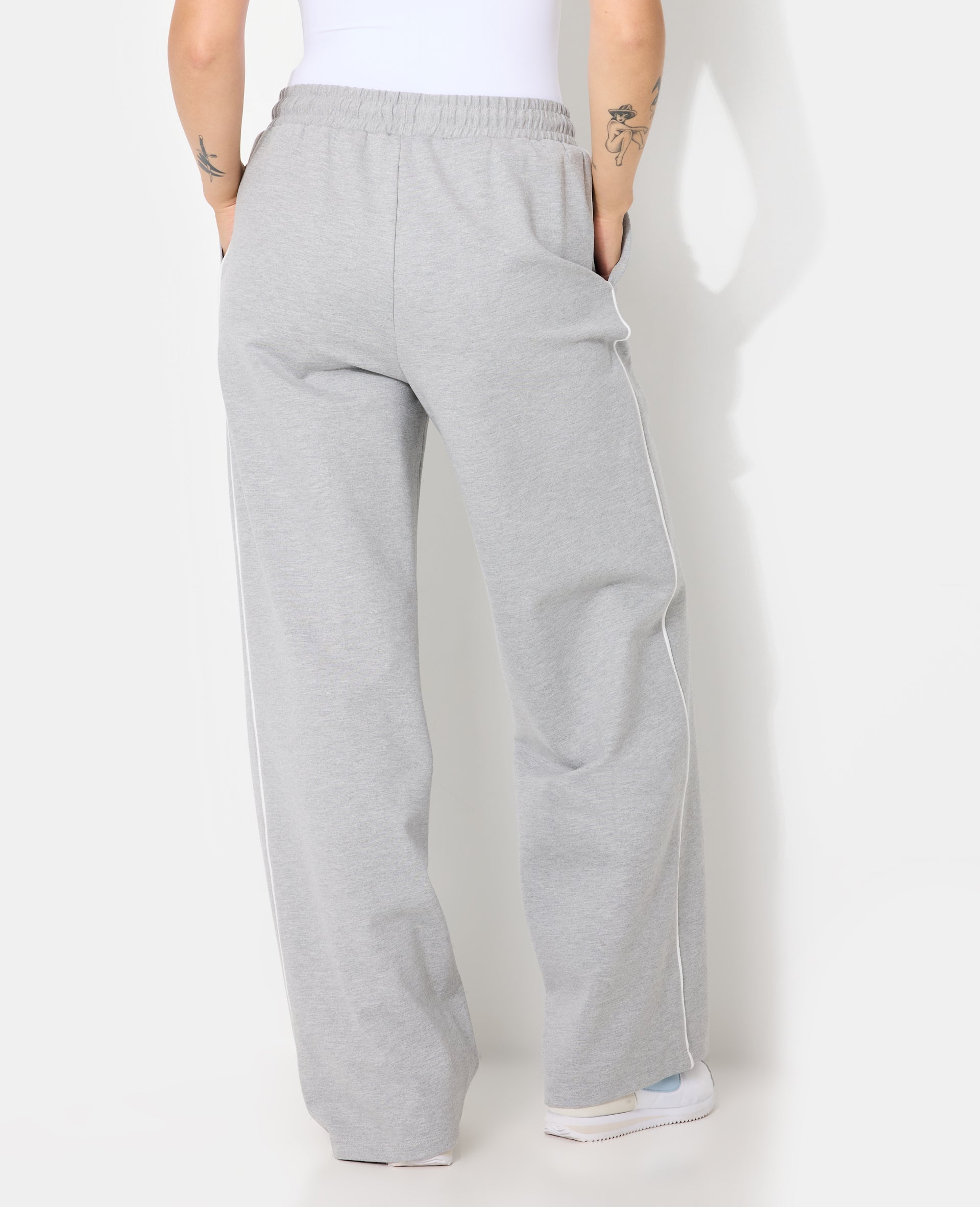 Pantalon esprit sport avec pinces et liserés