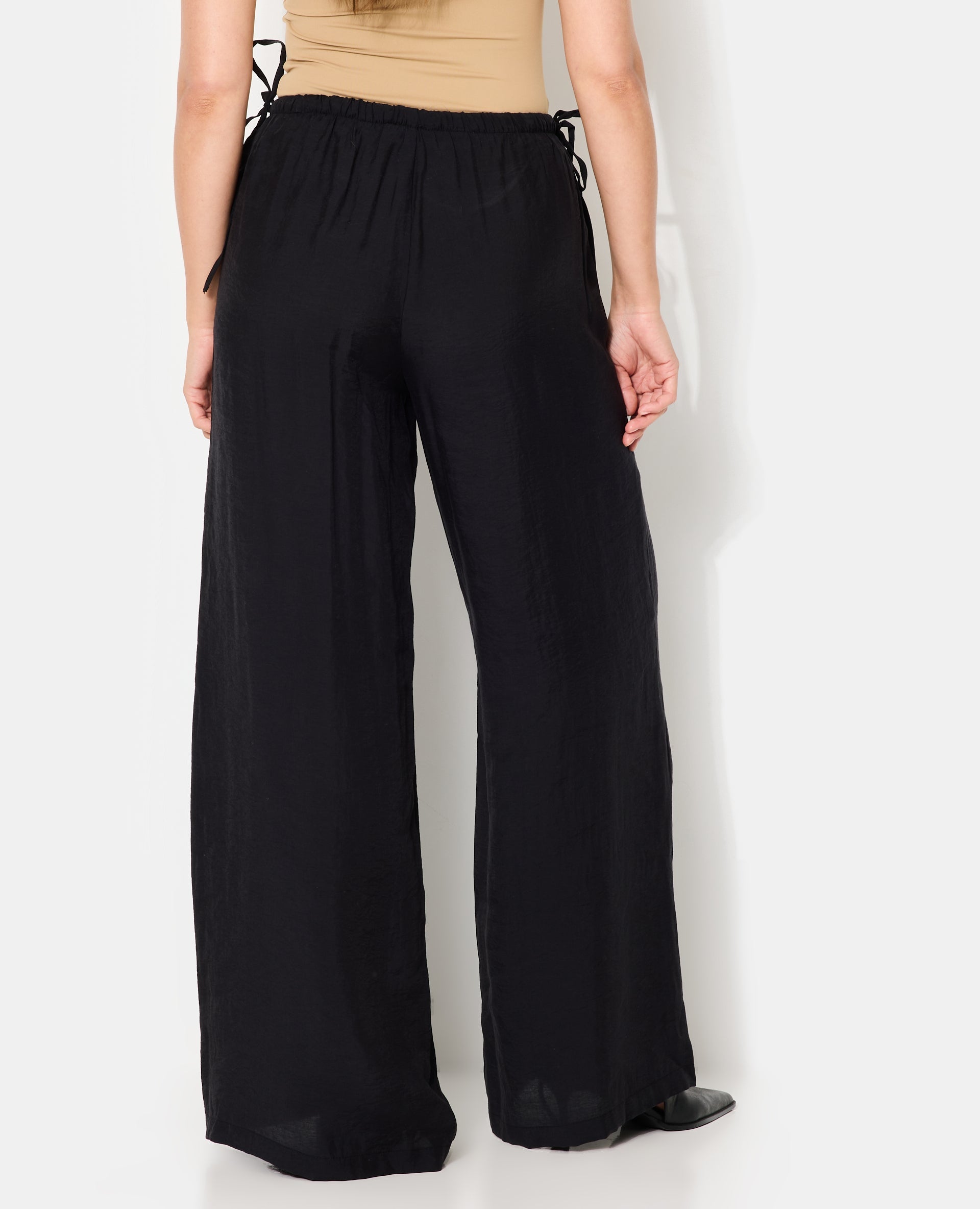 Pantalon palazzo en tissu effet peau de pêche
