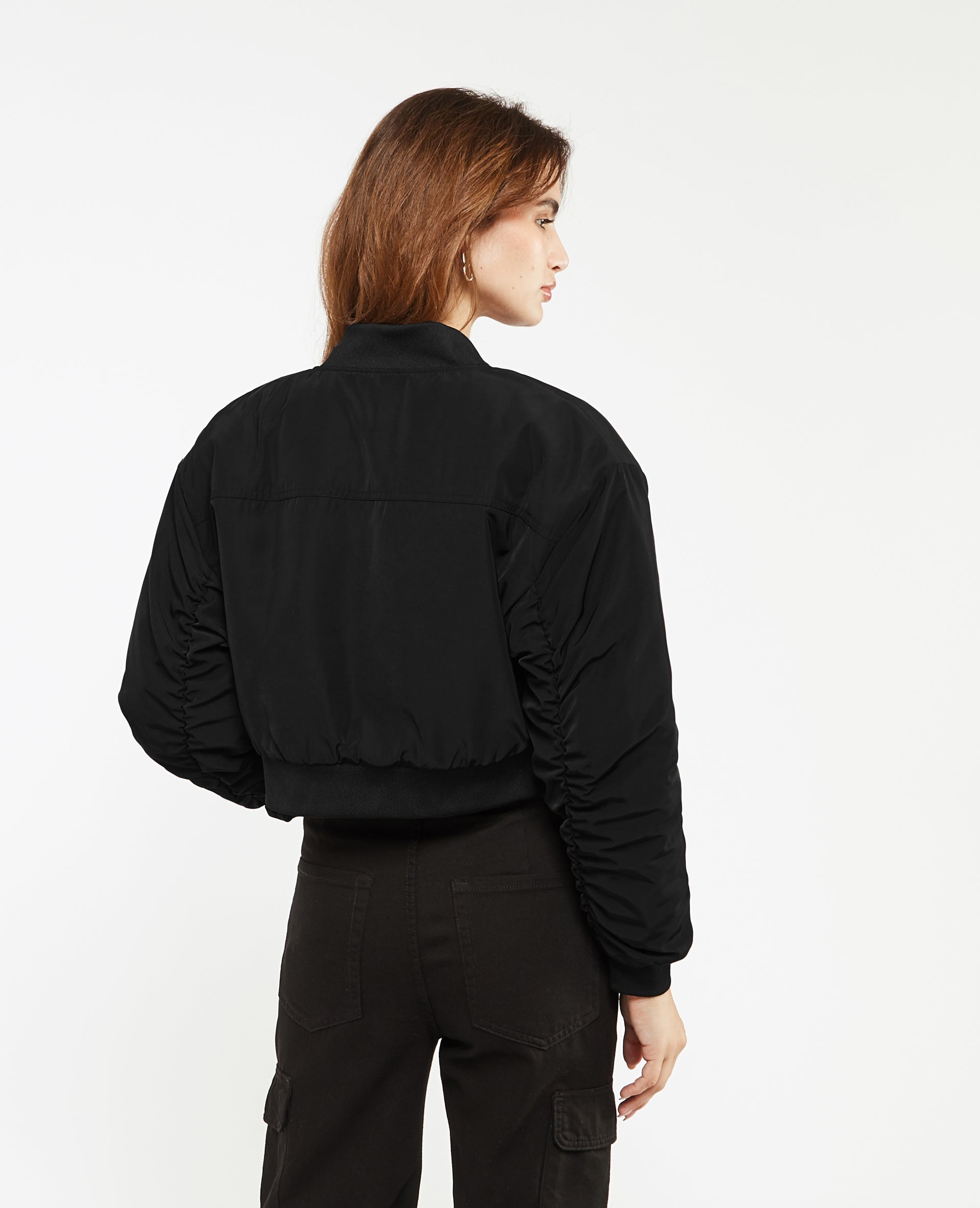 Bomber court avec poches et sangles