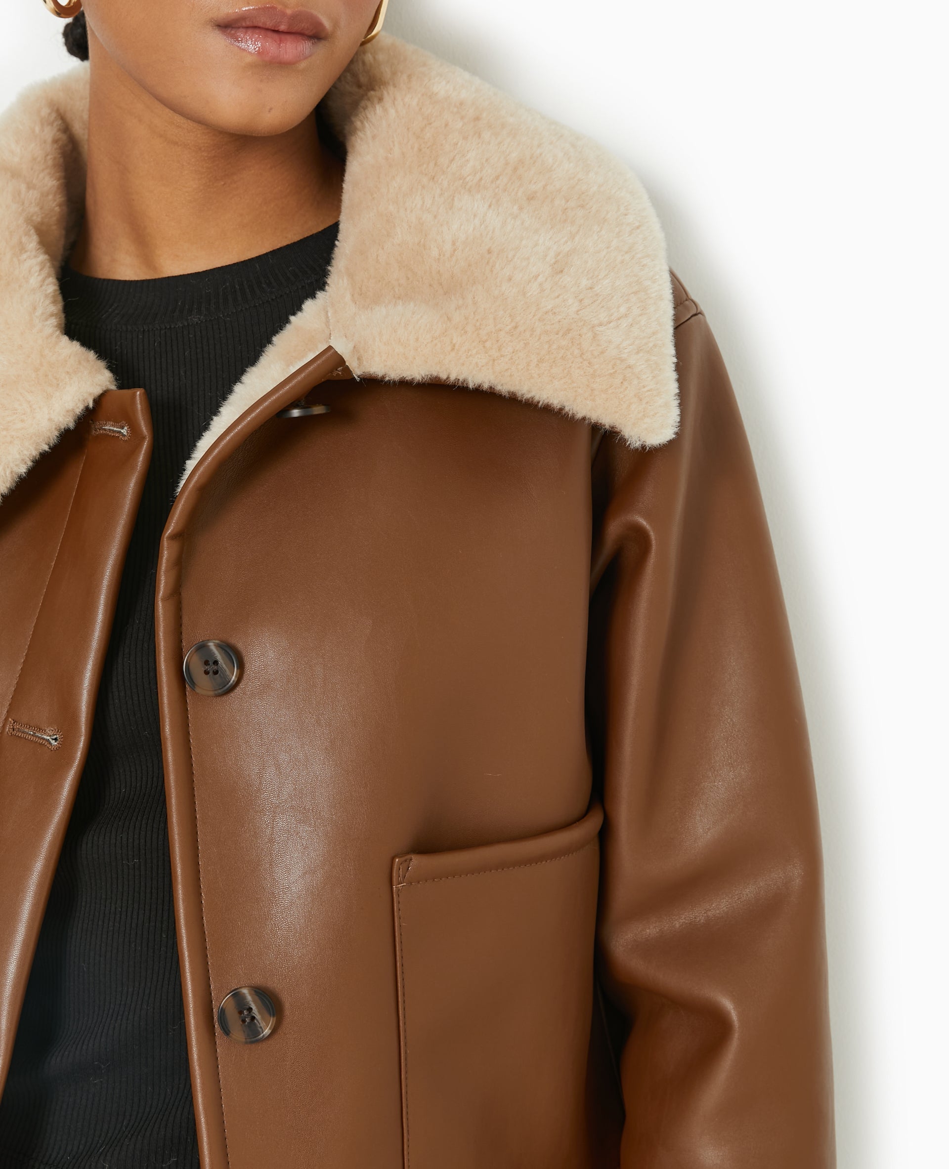 Blouson en simili avec doublure fourrure