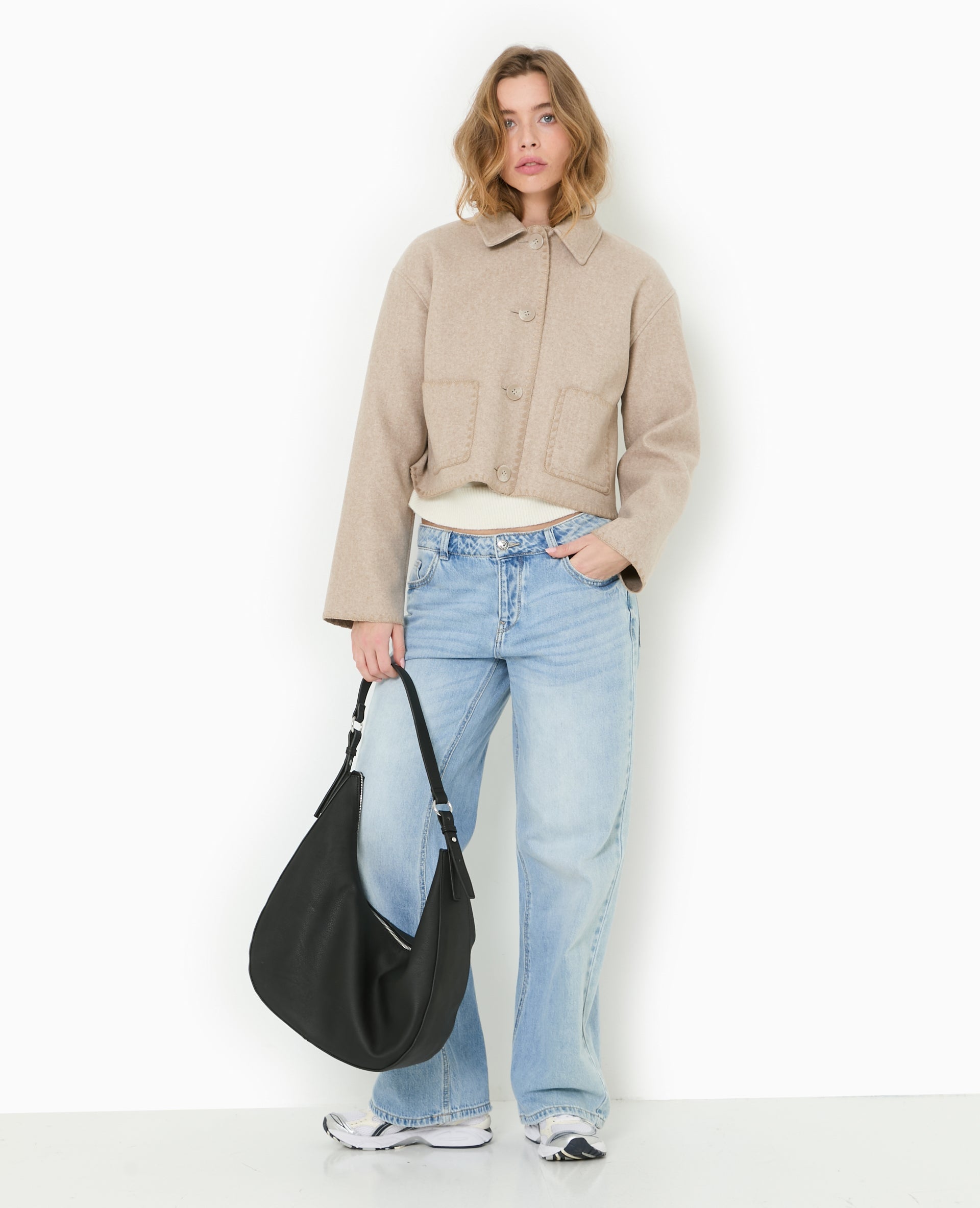 Manteau court avec coutures fantaisies