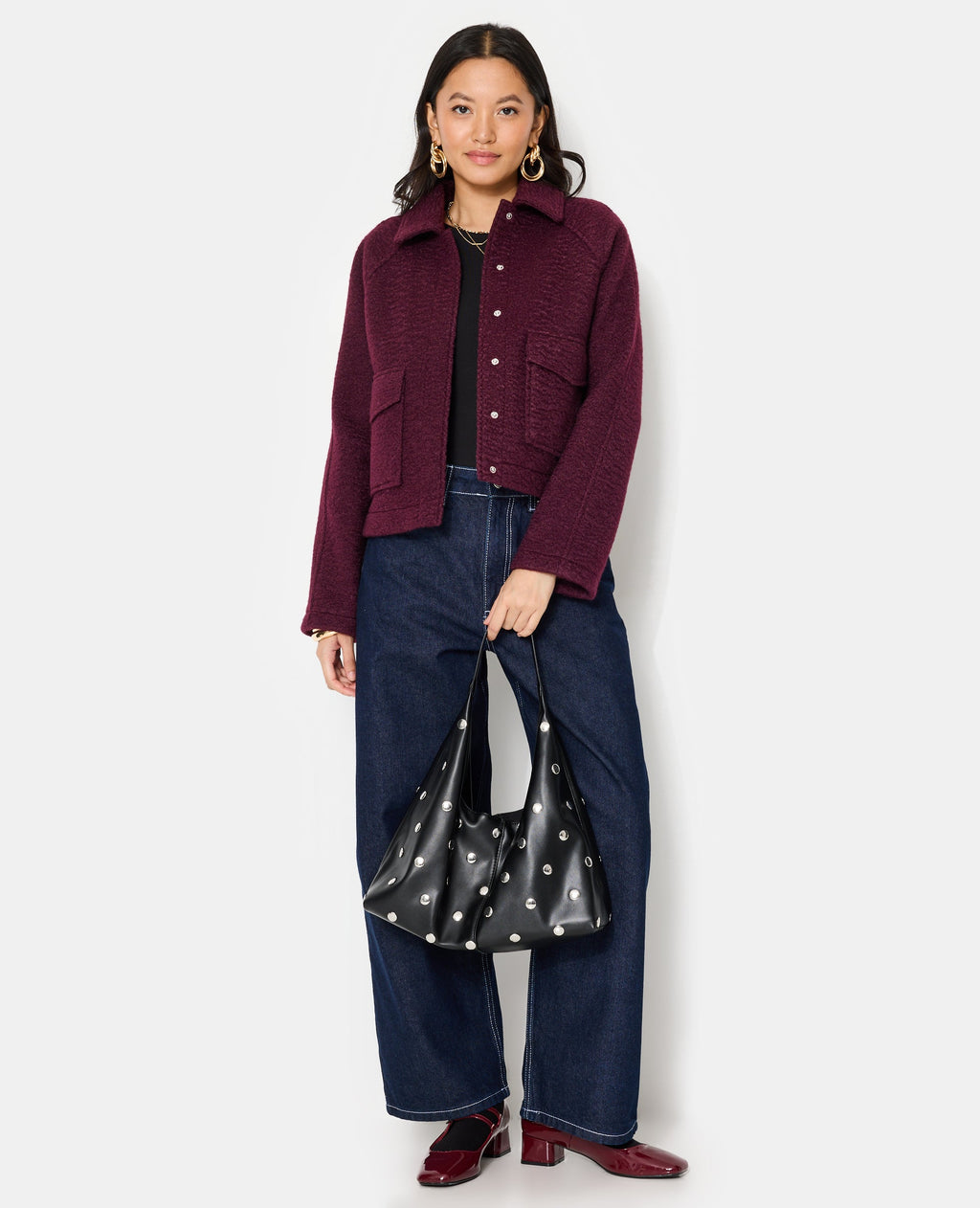 Blouson court effet drap de laine bouclée