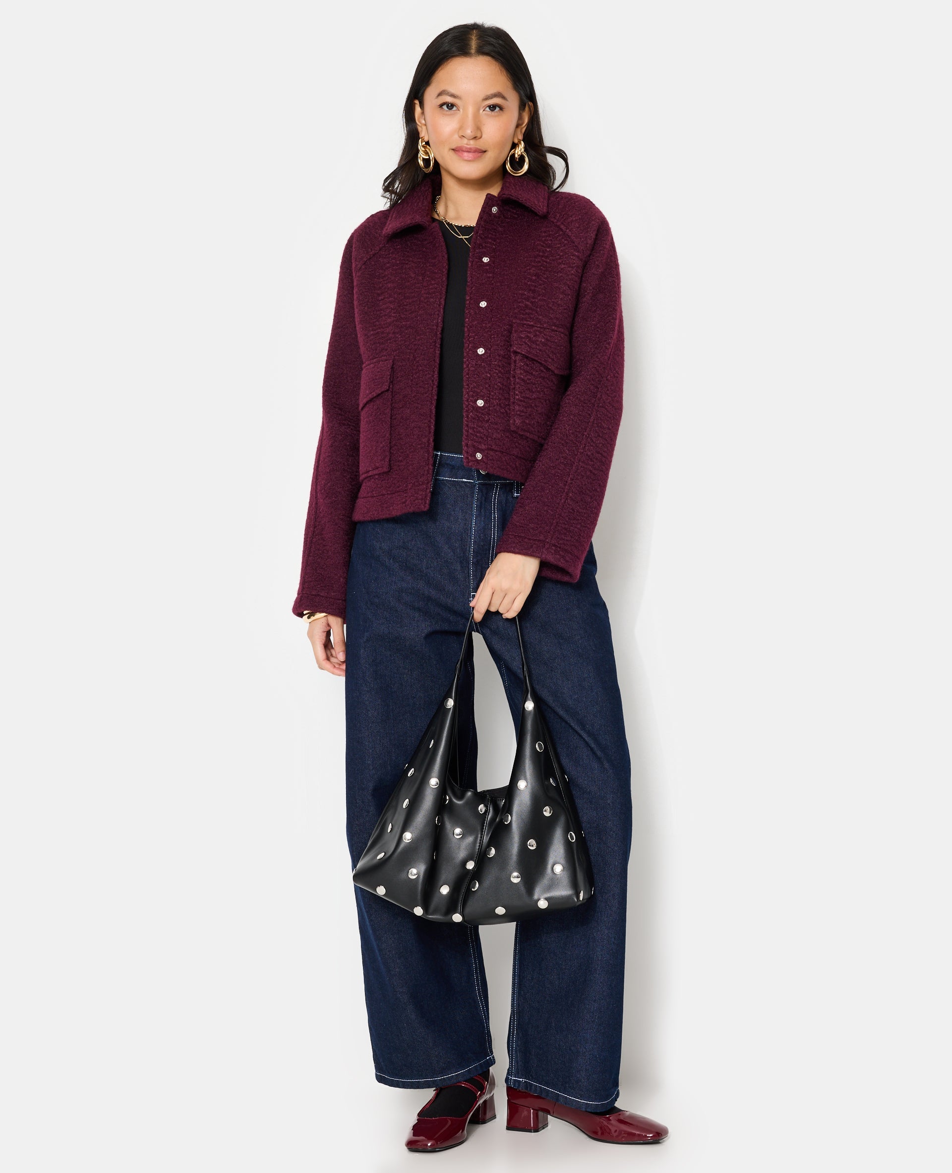 Blouson court effet drap de laine bouclée