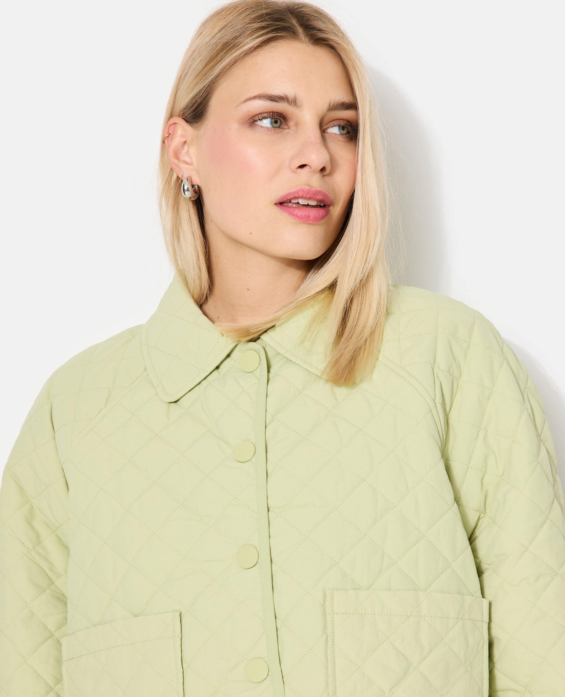 Blouson matelassé avec col et poches