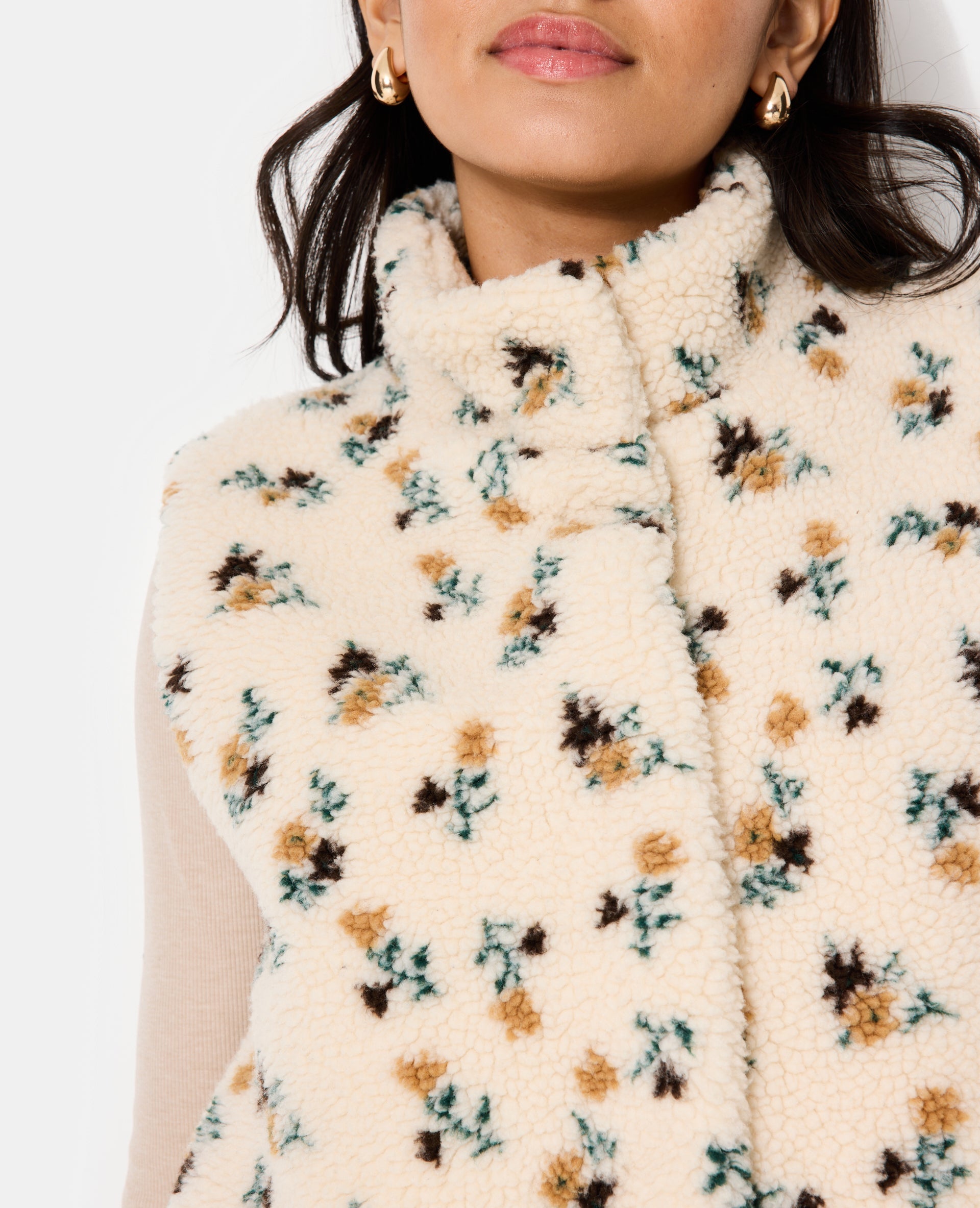 Veste sans manches en sherpa motif fleurs