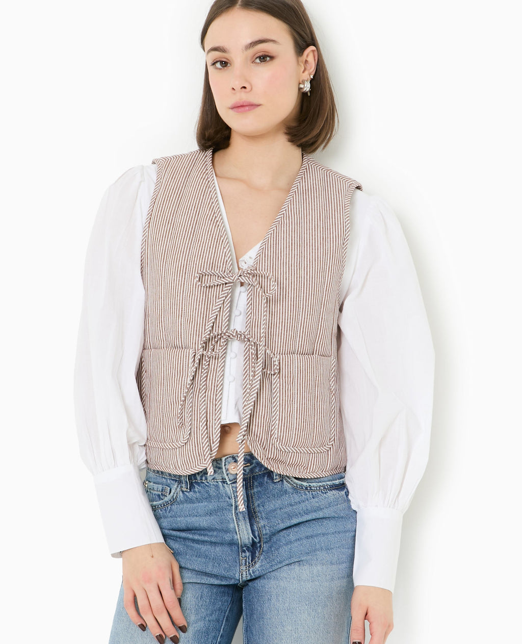 Veste sans manches matelassée avec rayures