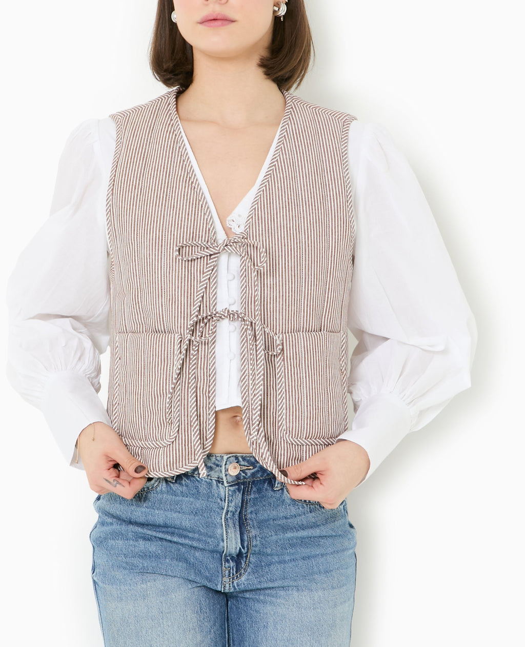 Veste sans manches matelassée avec rayures