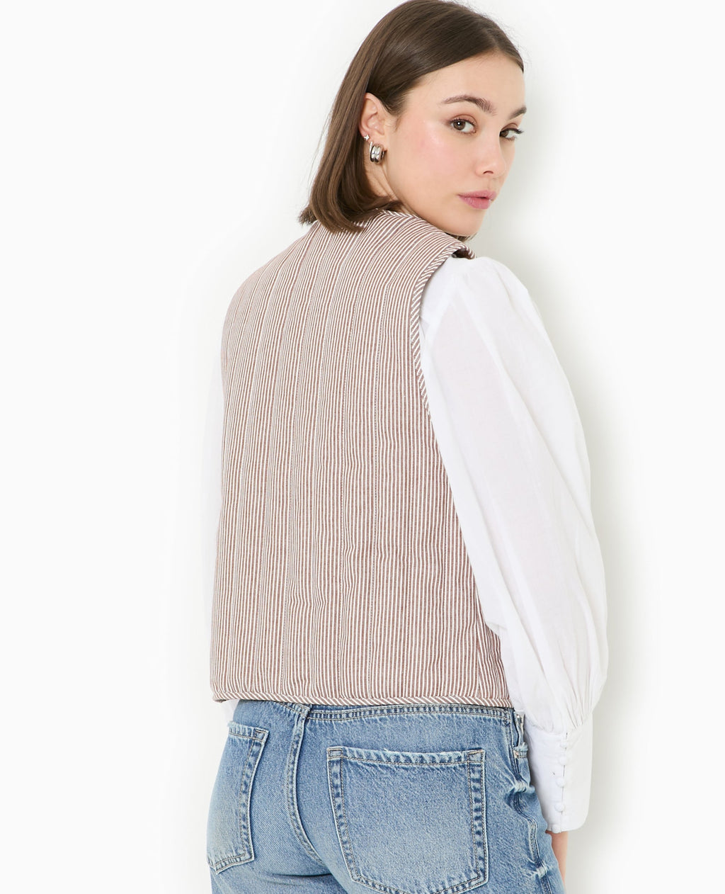 Veste sans manches matelassée avec rayures