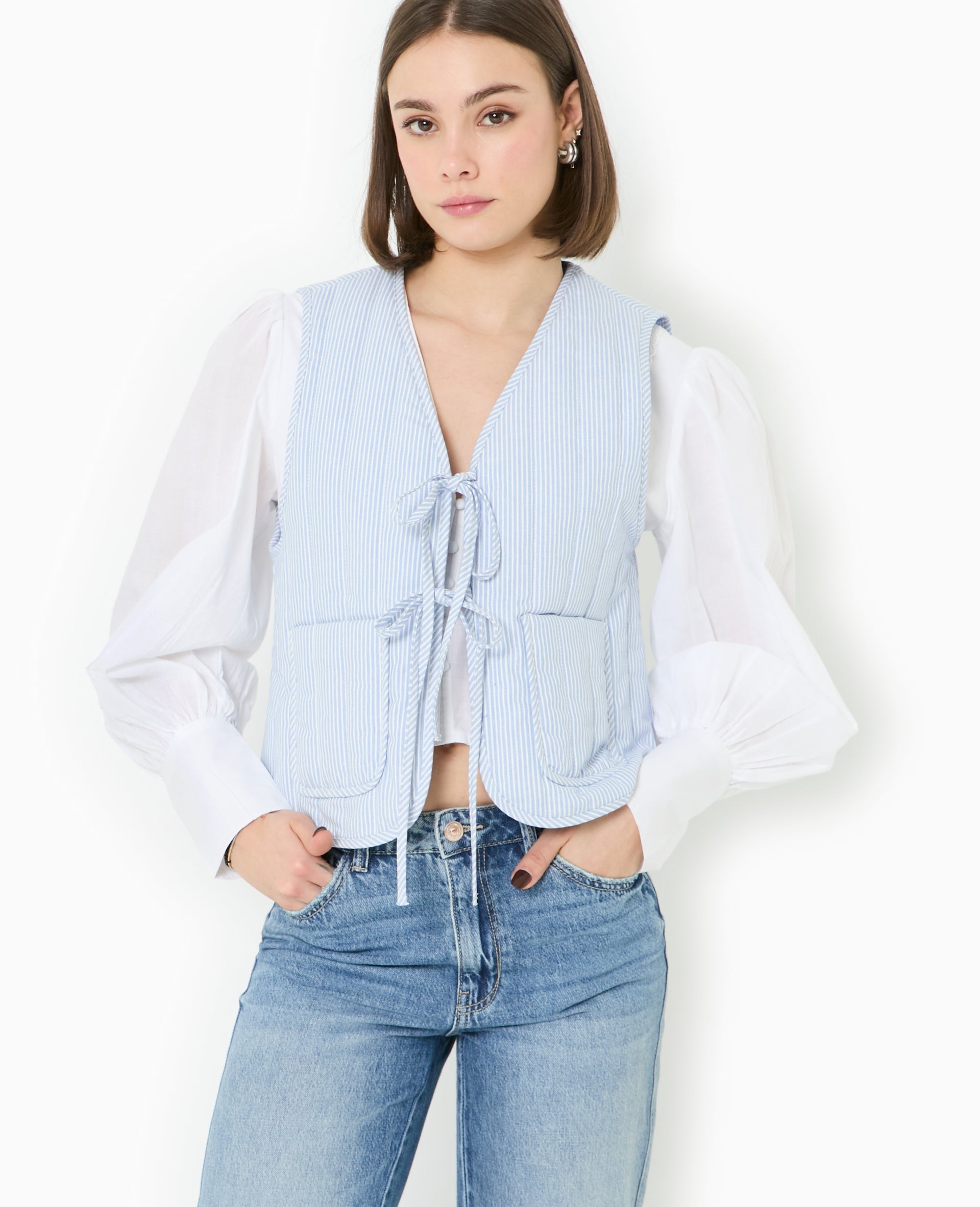 Veste sans manches matelassée avec rayures