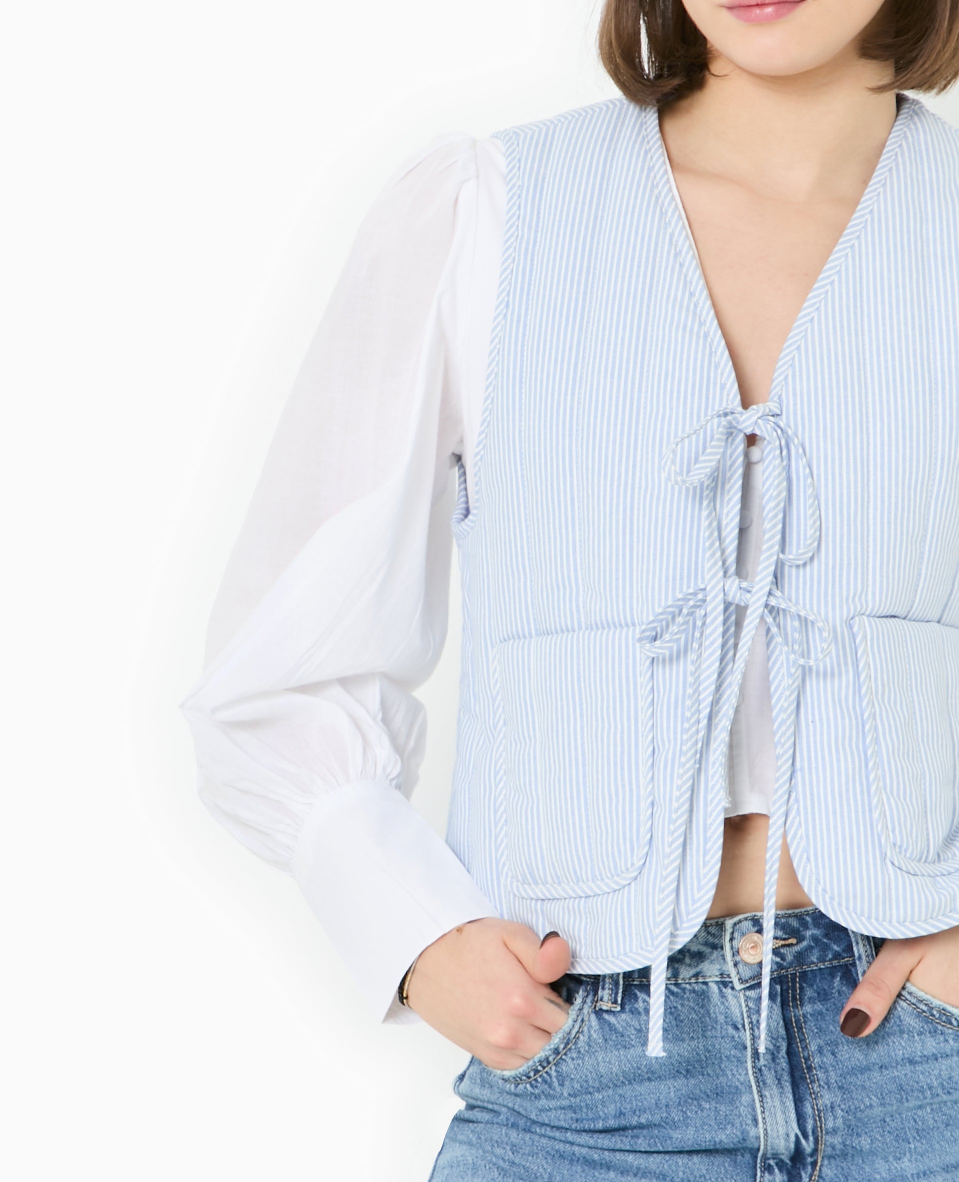 Veste sans manches matelassée avec rayures