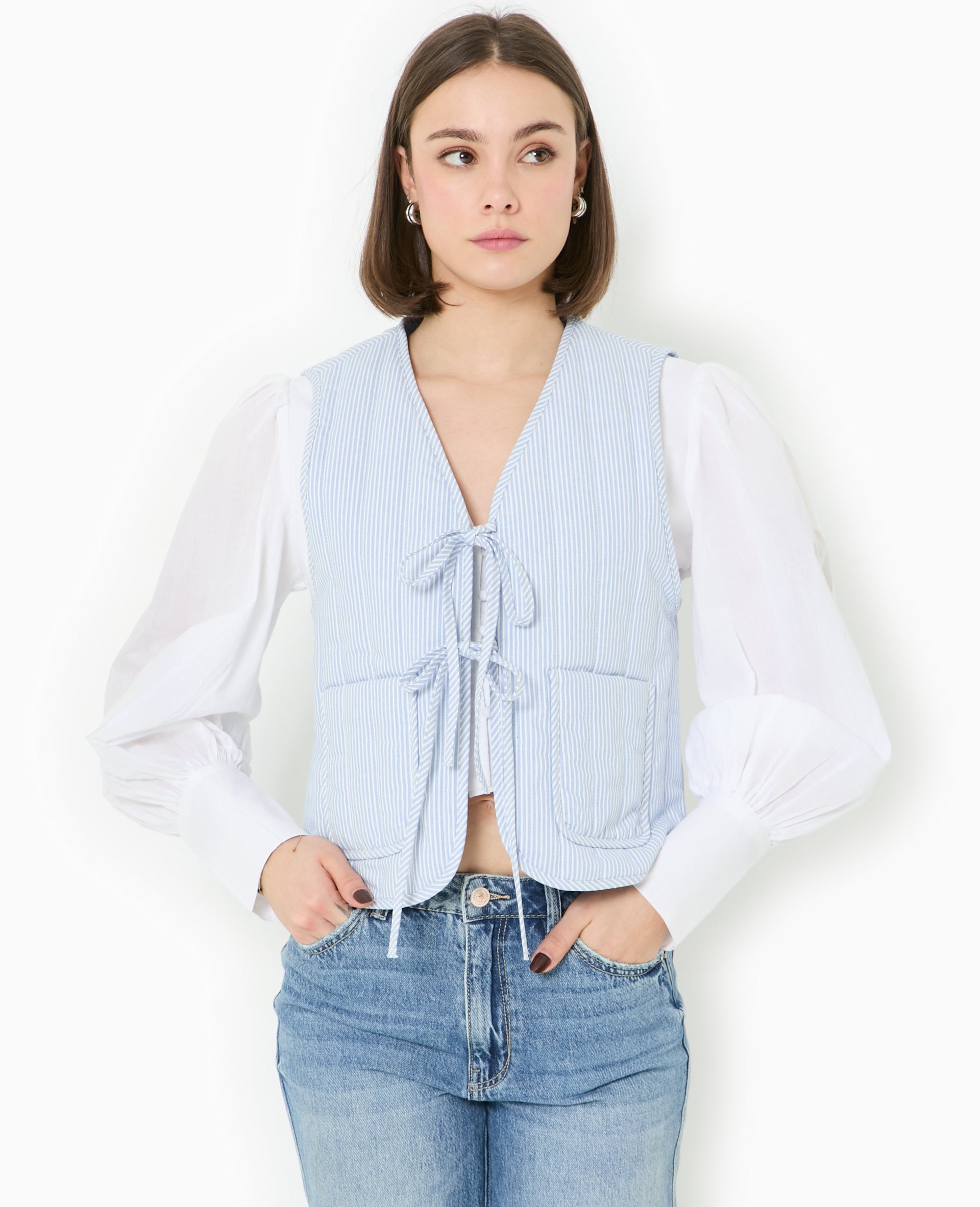 Veste sans manches matelassée avec rayures