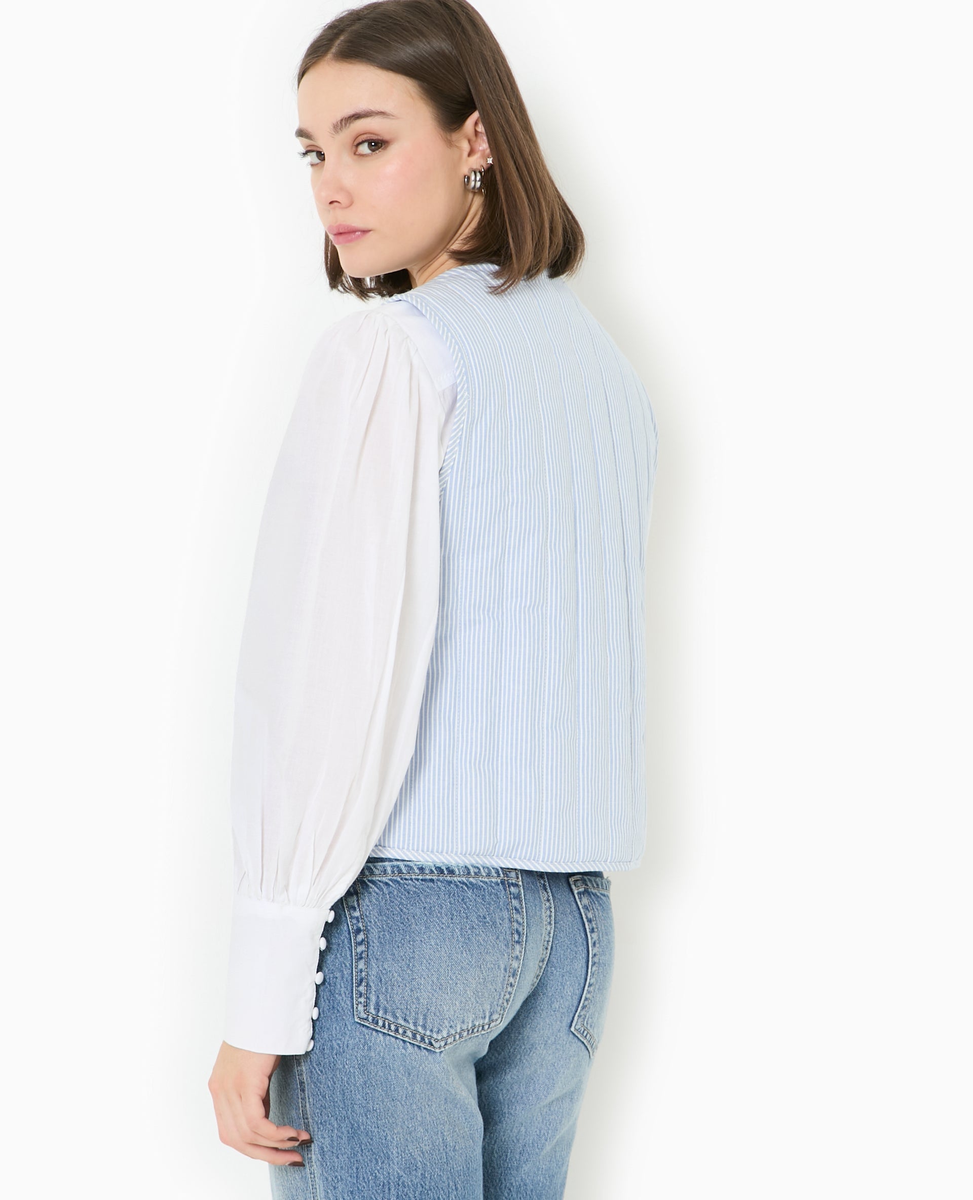 Veste sans manches matelassée avec rayures
