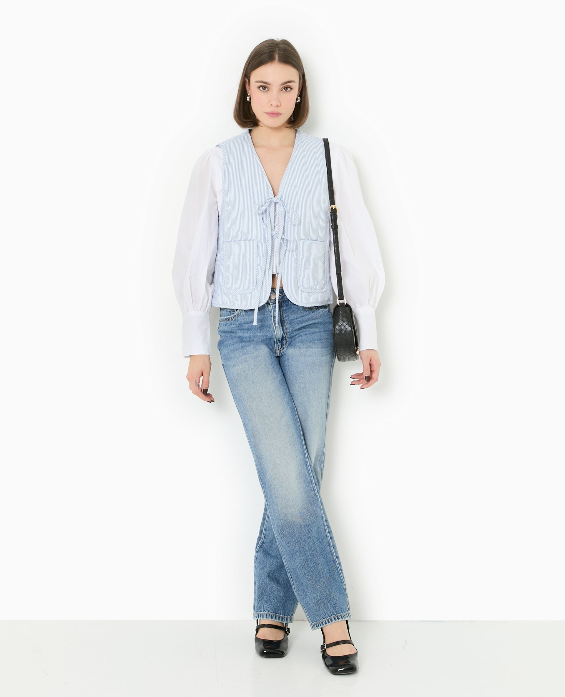 Veste sans manches matelassée avec rayures