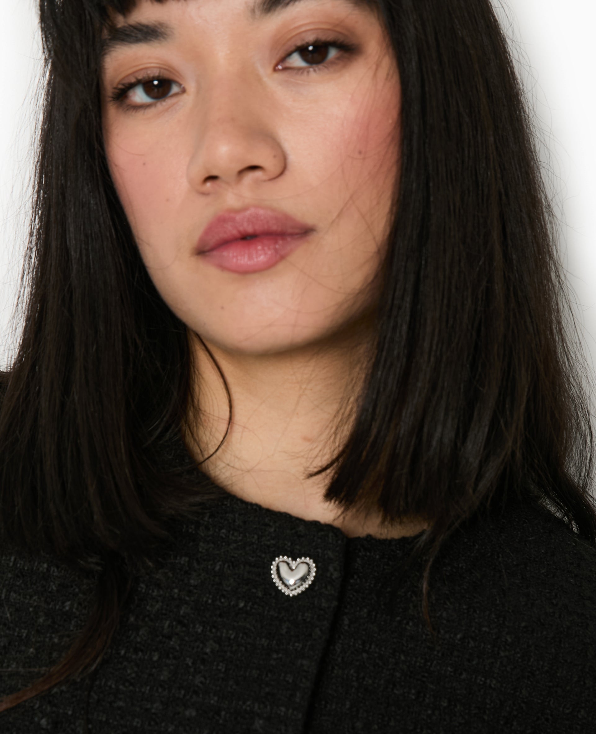 Veste courte en tweed avec boutons cœur