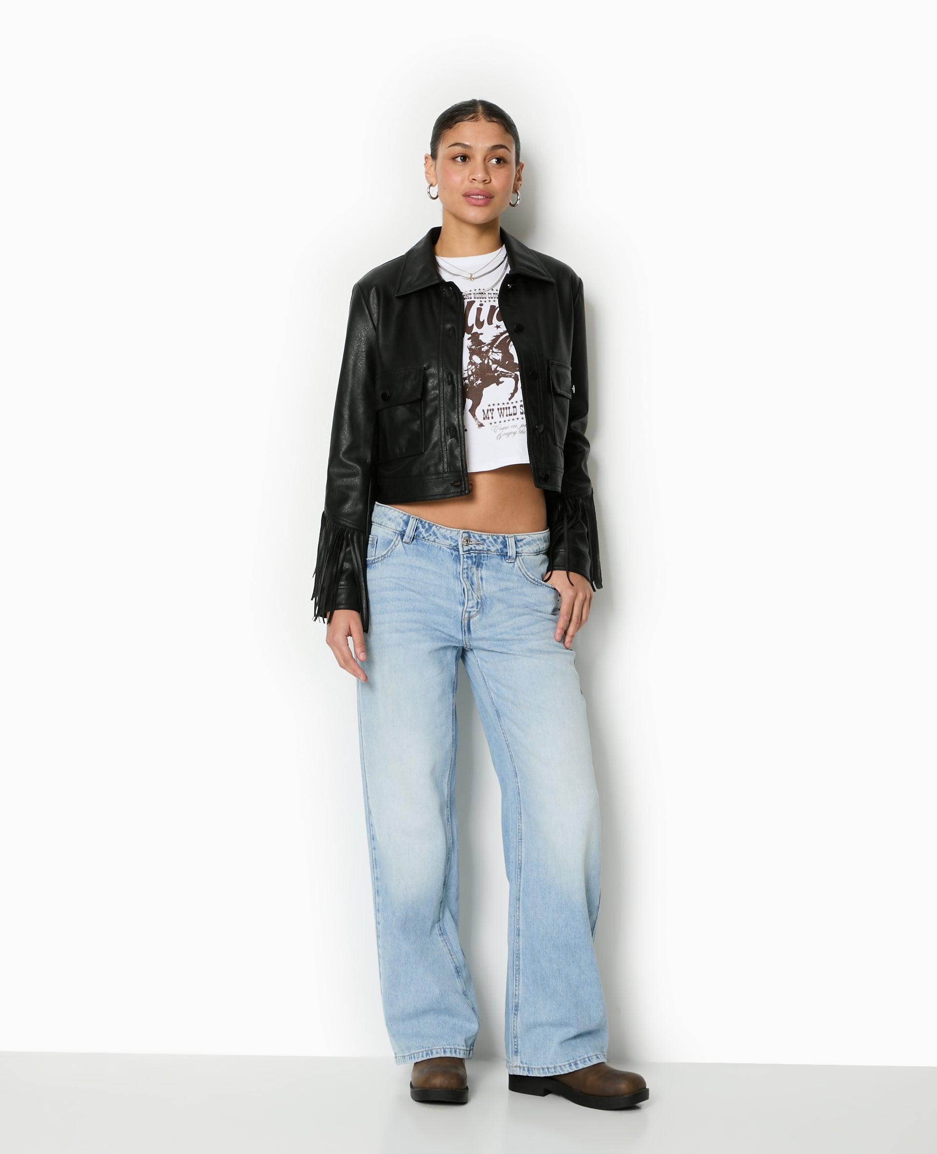Veste courte en simili avec franges