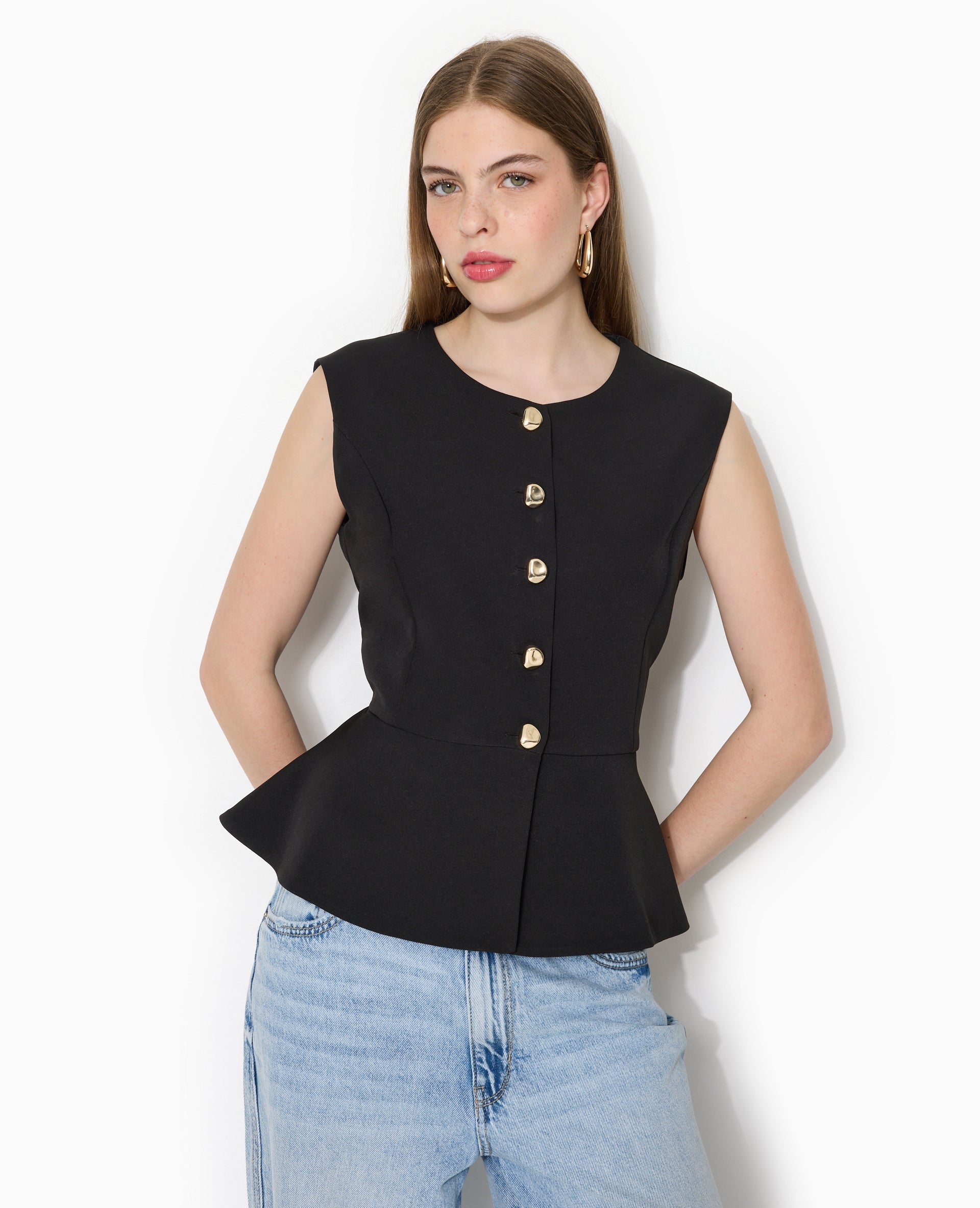 Veste sans manches peplum avec boutons fantaisie