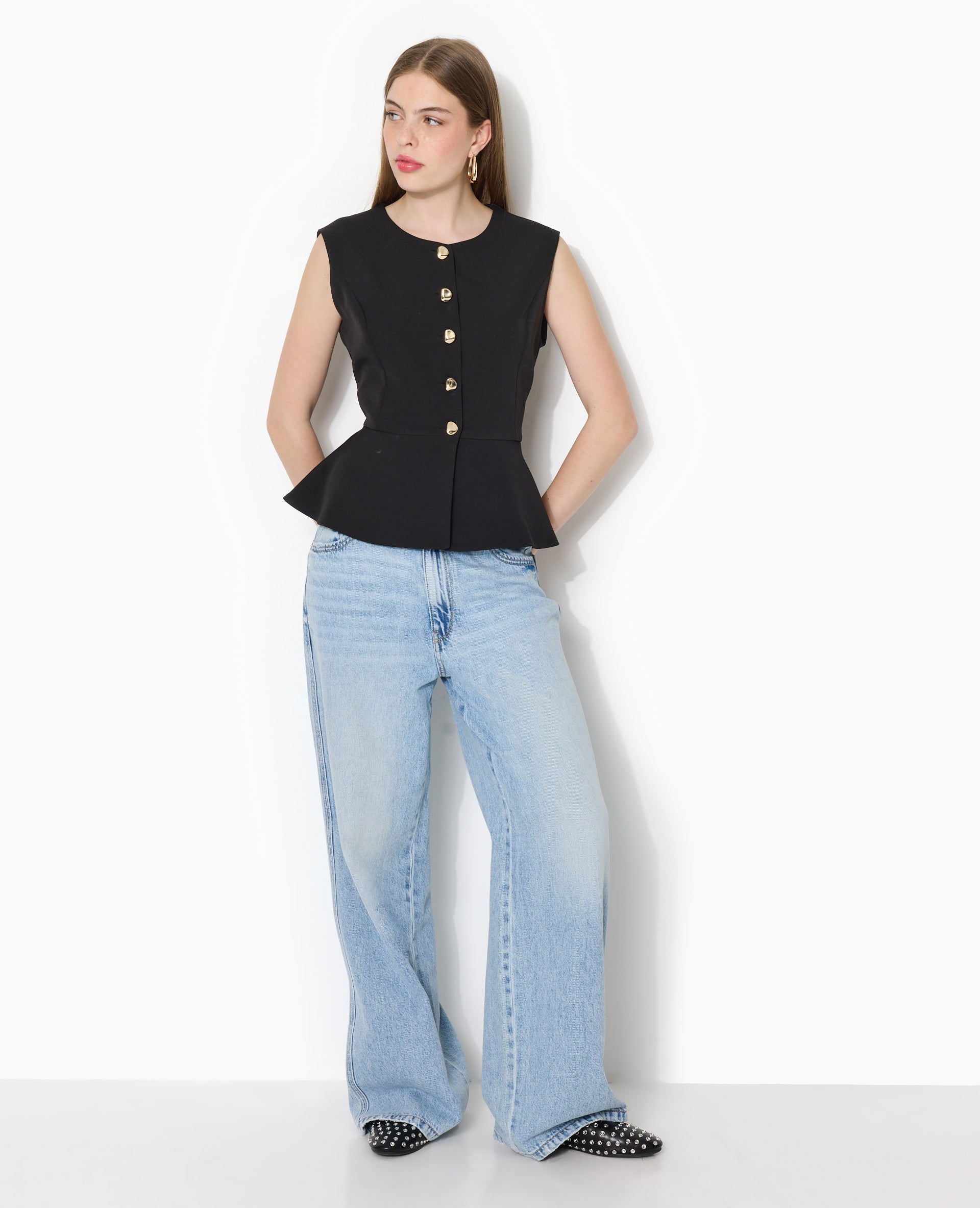 Veste sans manches peplum avec boutons fantaisie