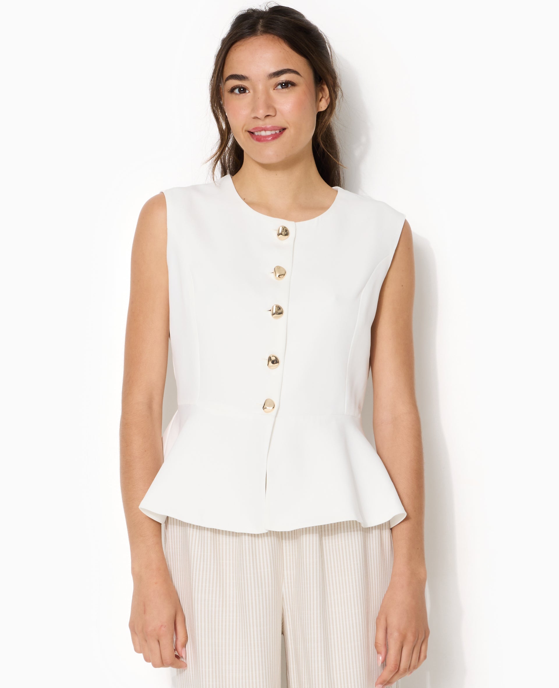Veste sans manches peplum avec boutons fantaisie