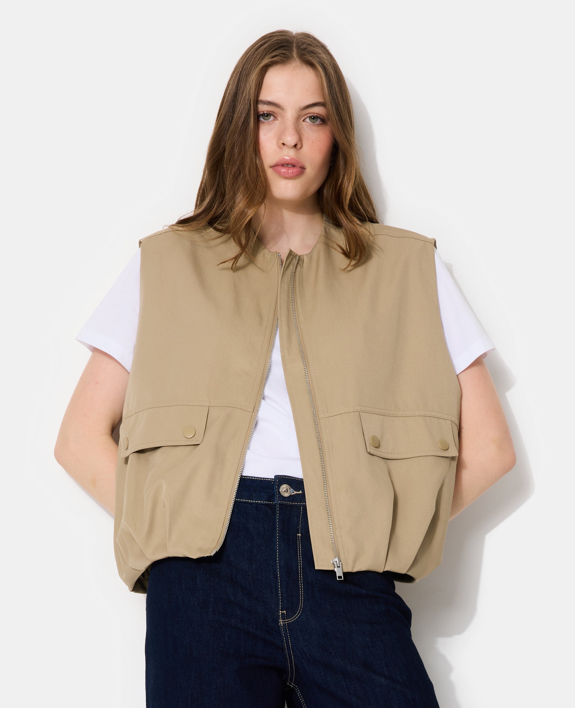Blouson sans manches zippée avec effet bouffant