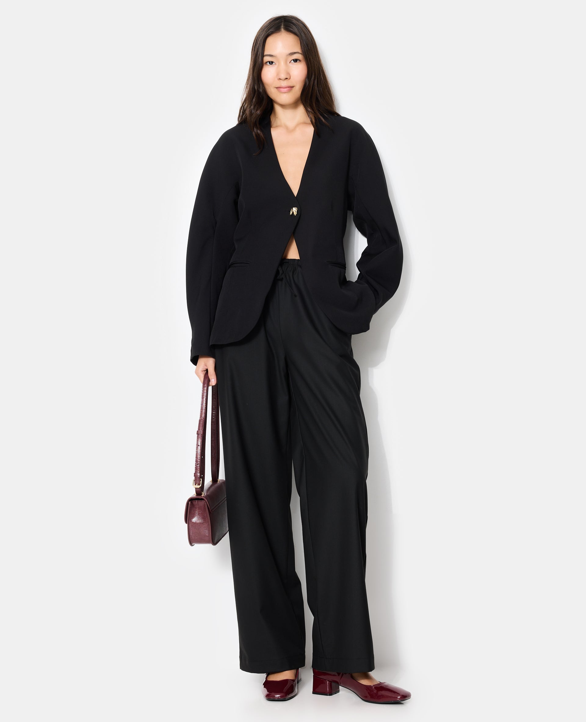 Veste blazer cintrée avec manches bouffantes
