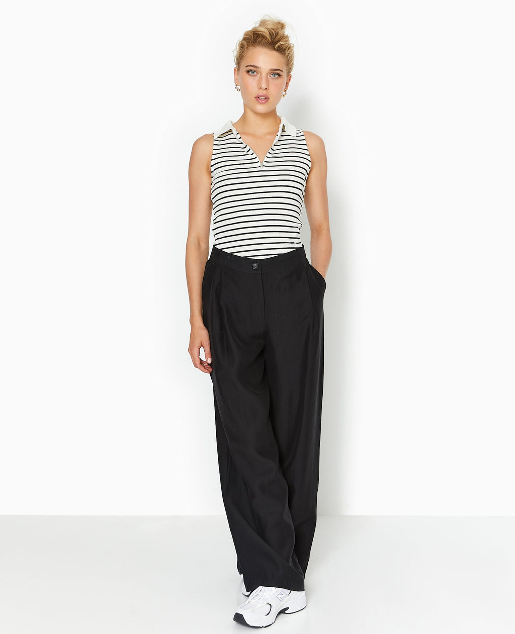Top zippé sans manches avec col polo