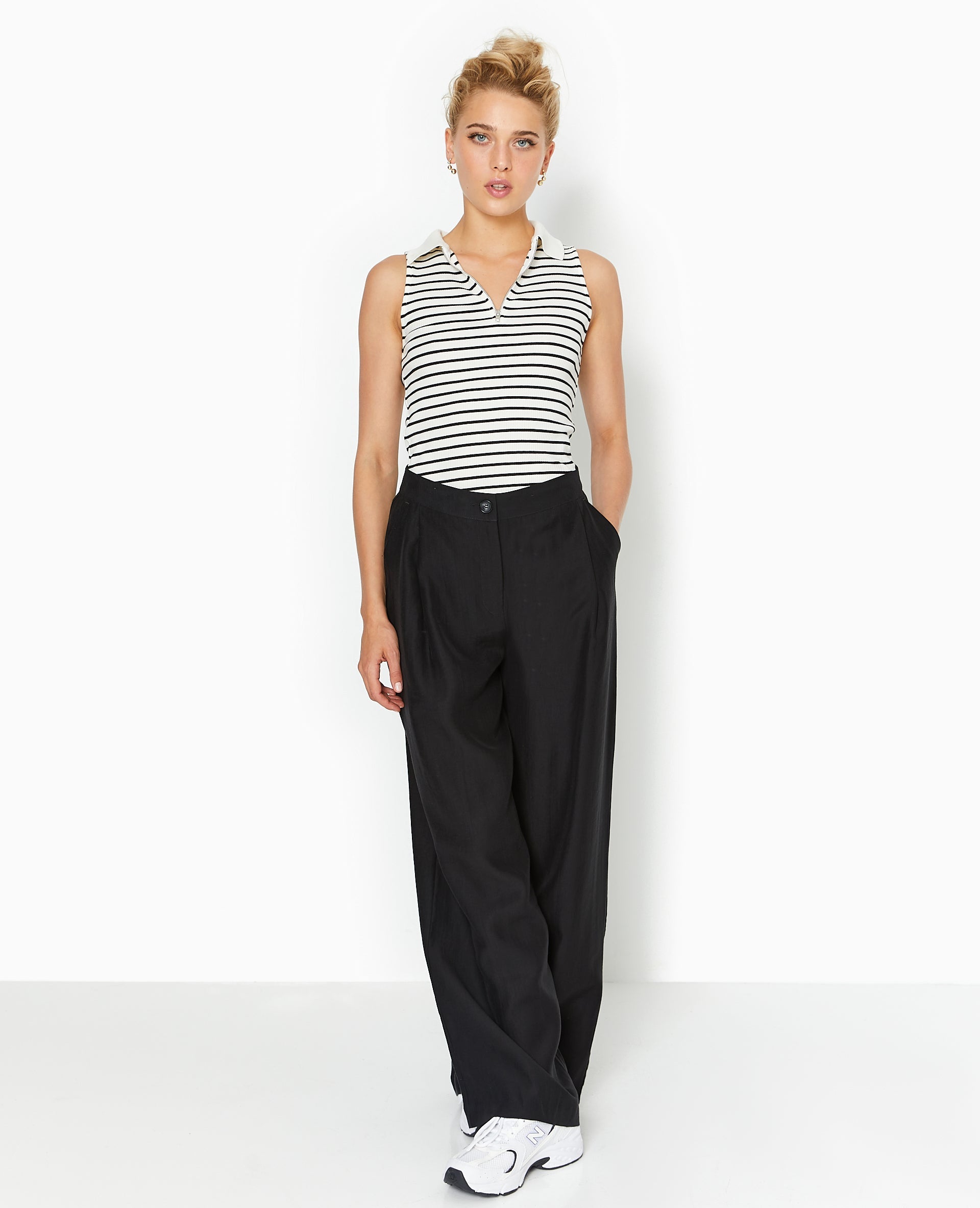 Top zippé sans manches avec col polo
