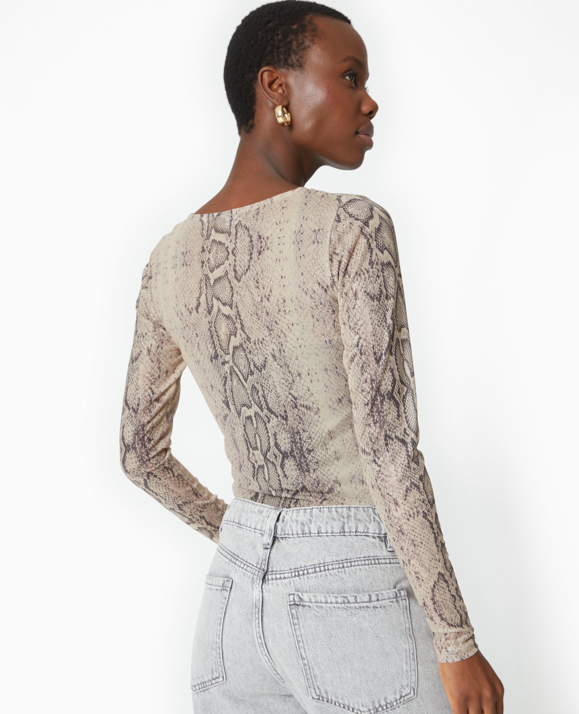 Top manches longues en résille motif python