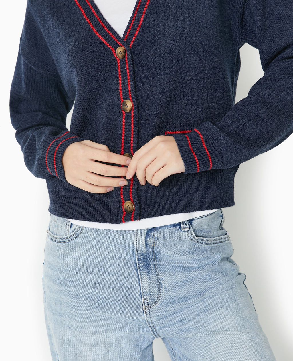 Gilet col V avec bords contrastés