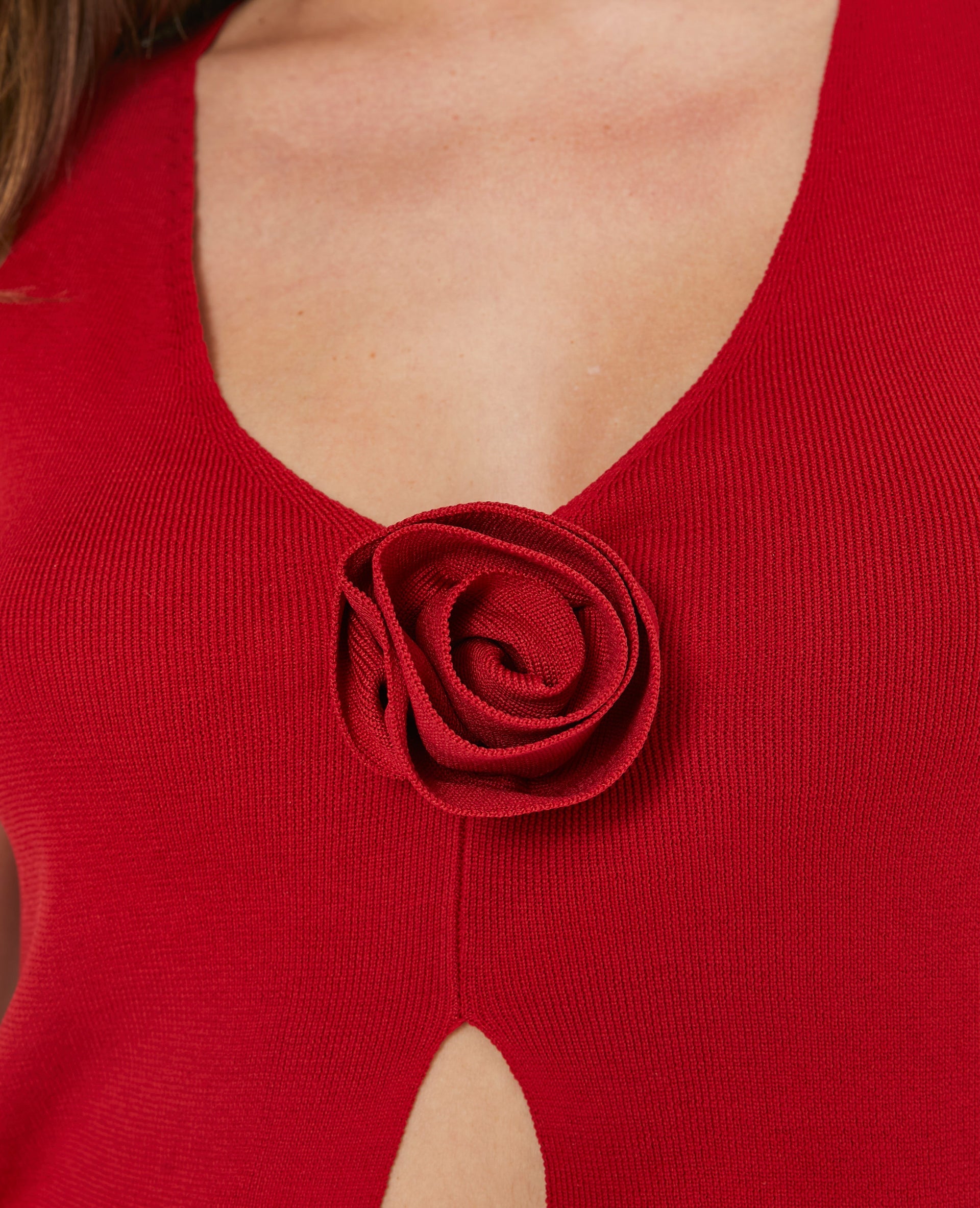 Top sans manches en maille avec fleur
