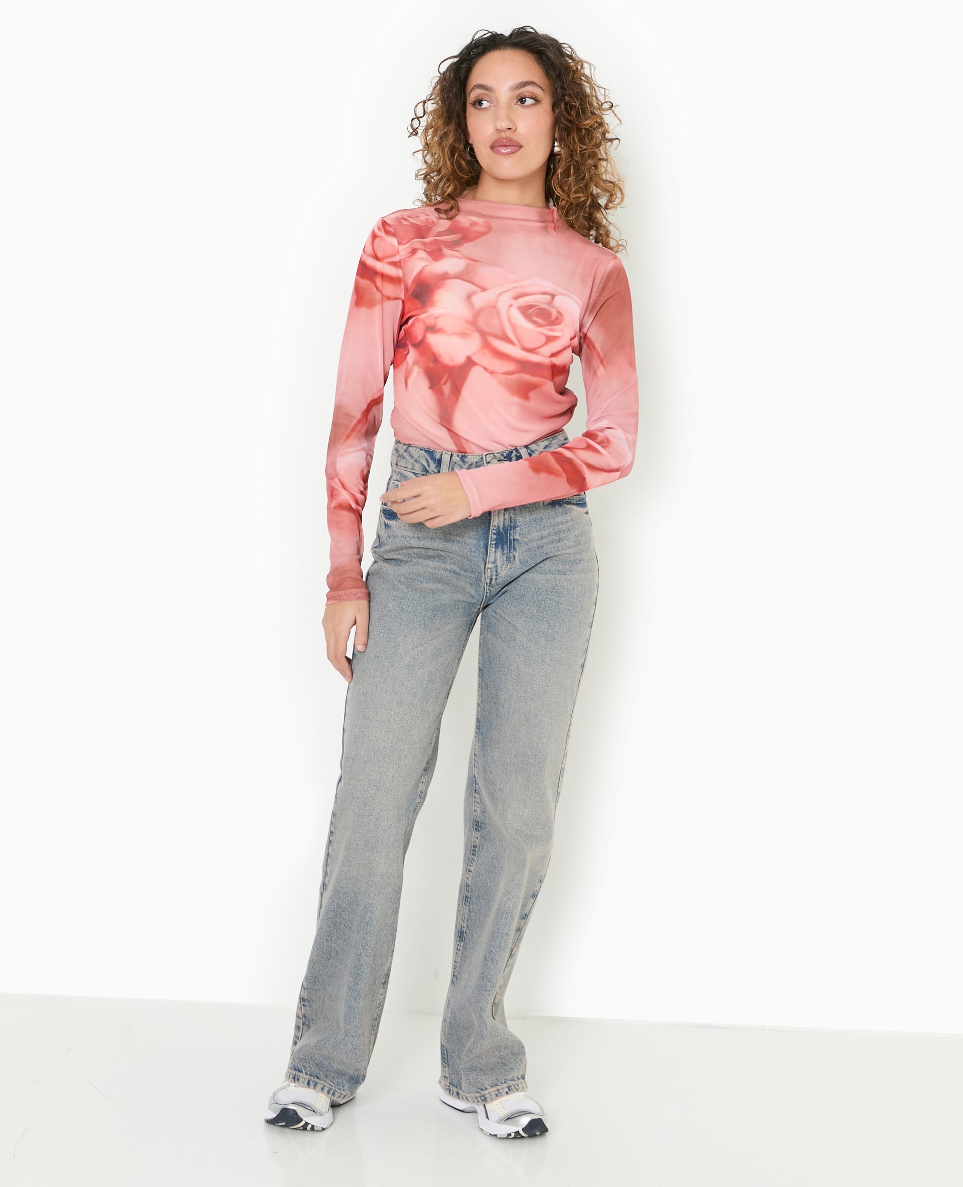 Top manches longues en résille motif roses