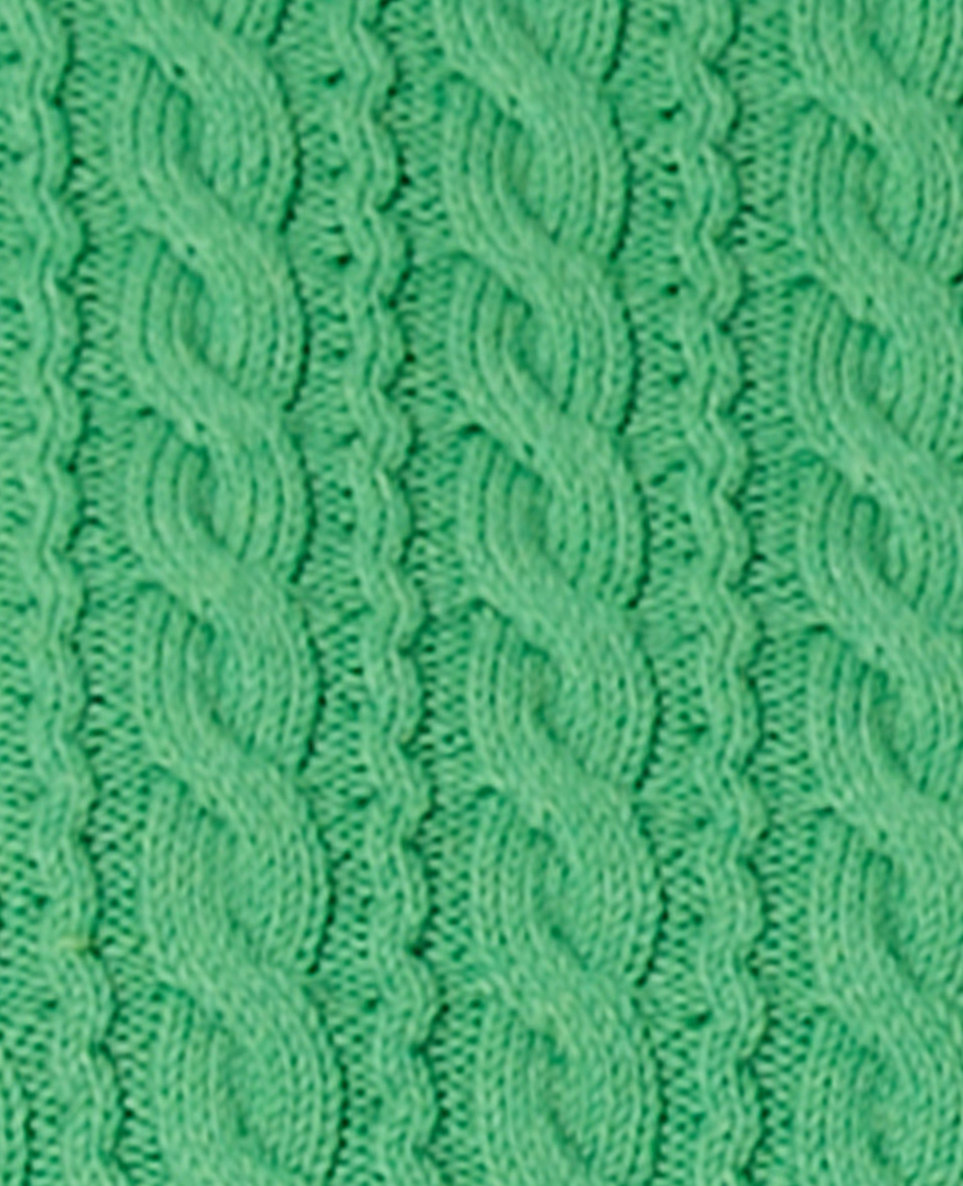 Pull en maille torsadée