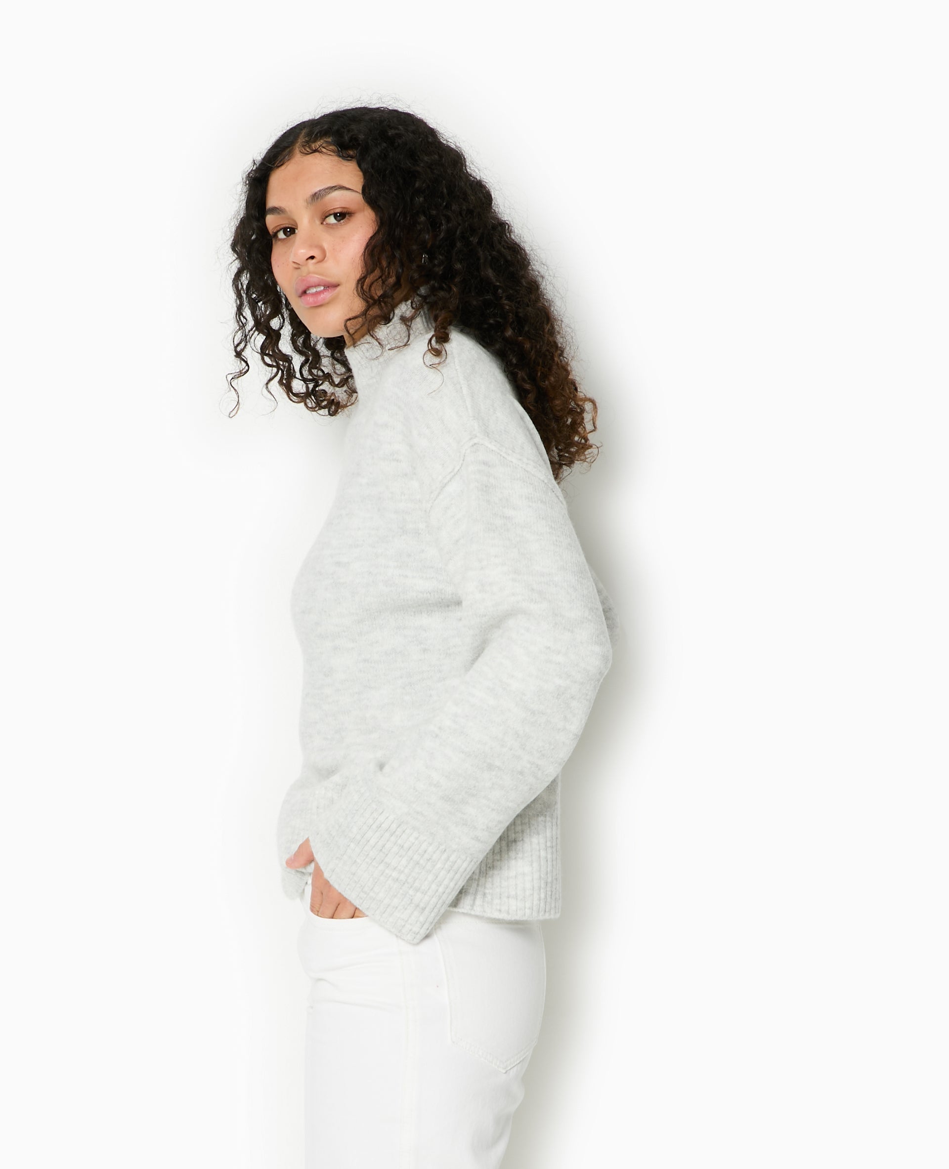 Pull col montant manches larges