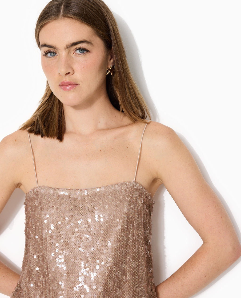 Top dos ouvert en maille ajourée avec sequins