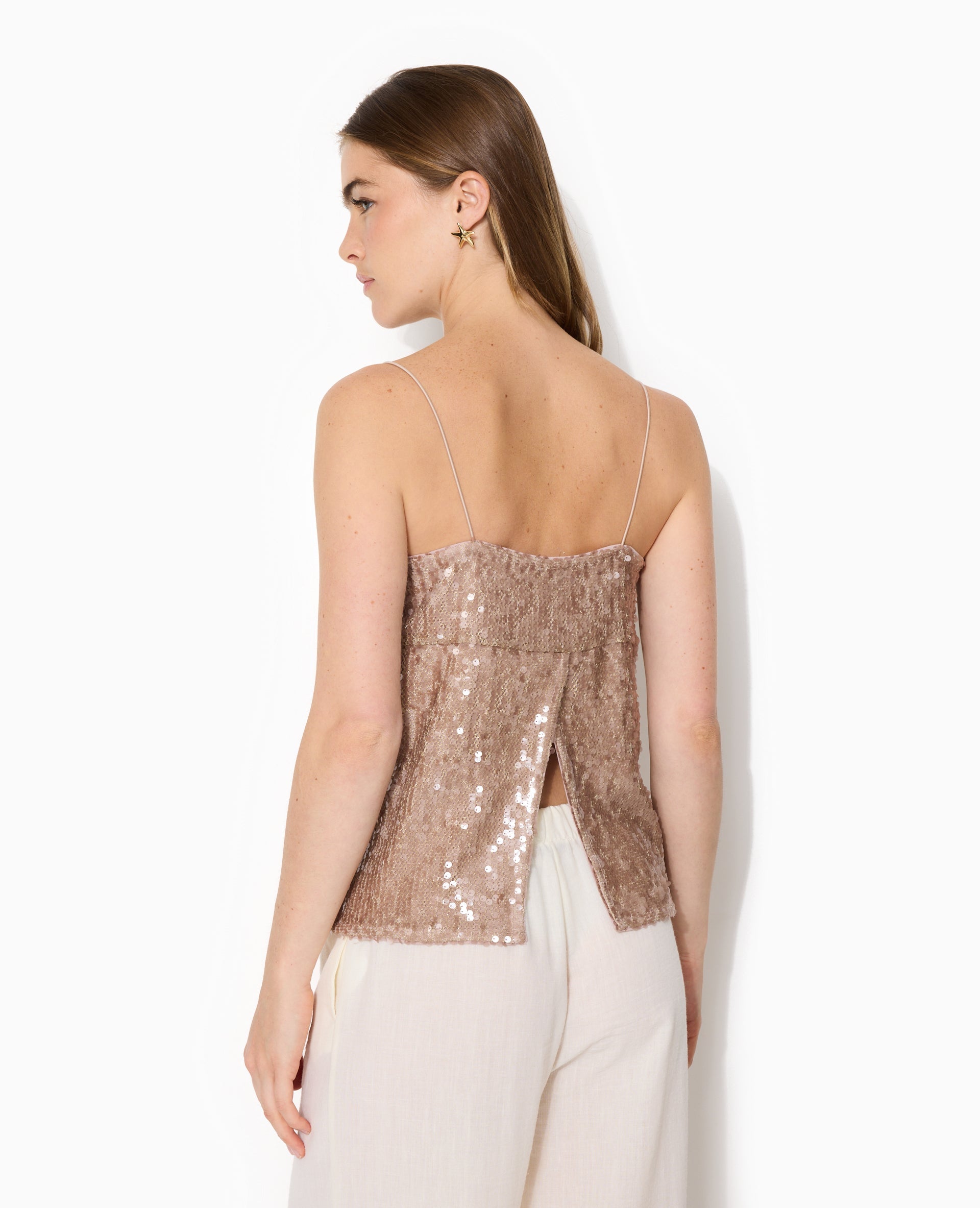 Top dos ouvert en maille ajourée avec sequins