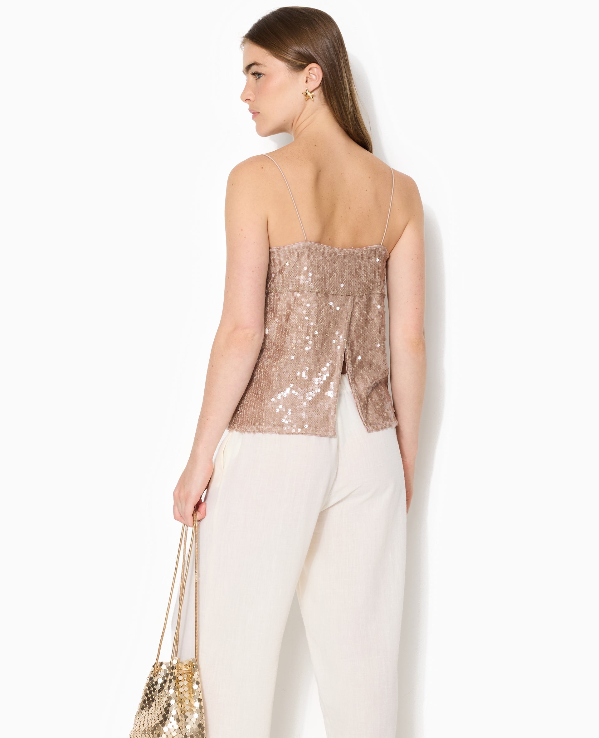 Top dos ouvert en maille ajourée avec sequins