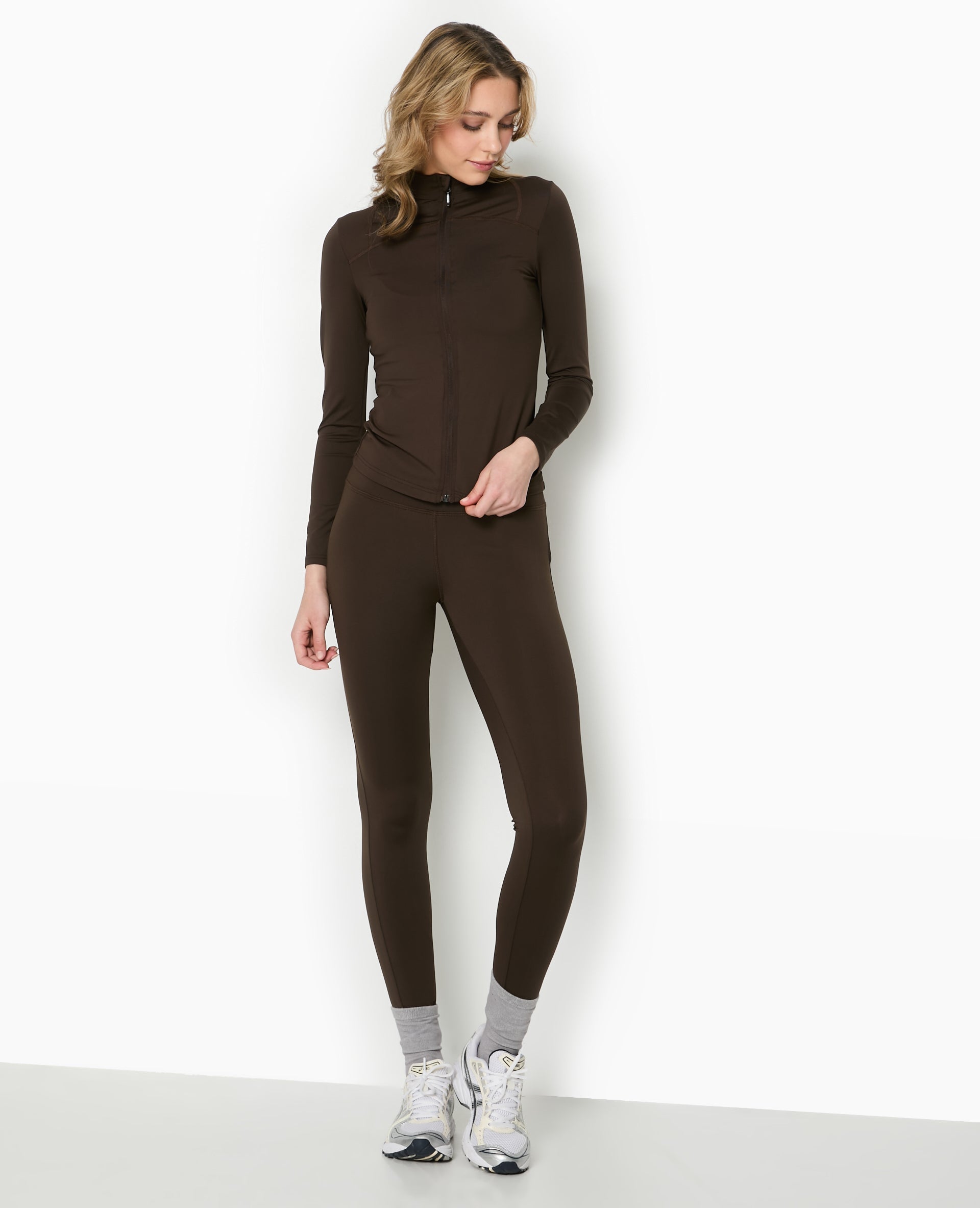 Gilet zippé en maille extensible et sculptante