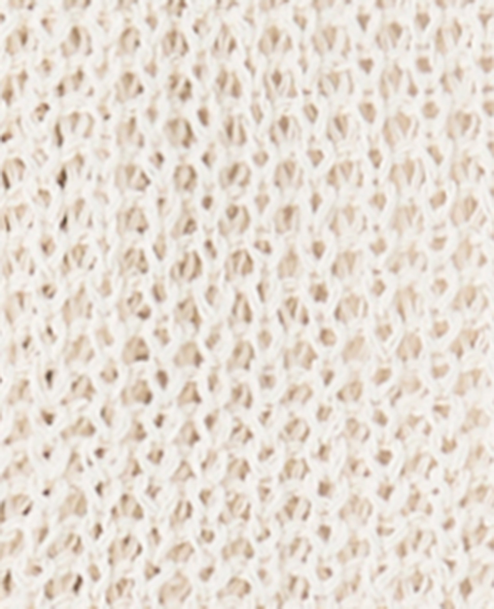 Gilet court en maille ajourée avec boutons bijoux