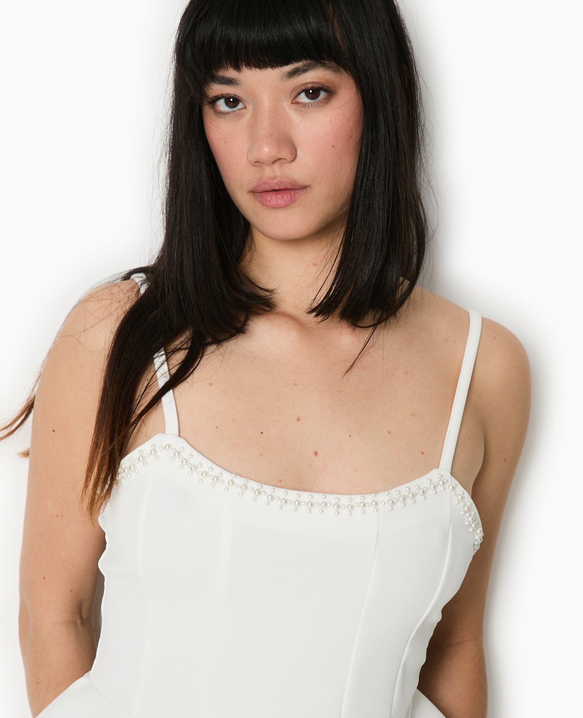Top peplum à bretelles avec perles