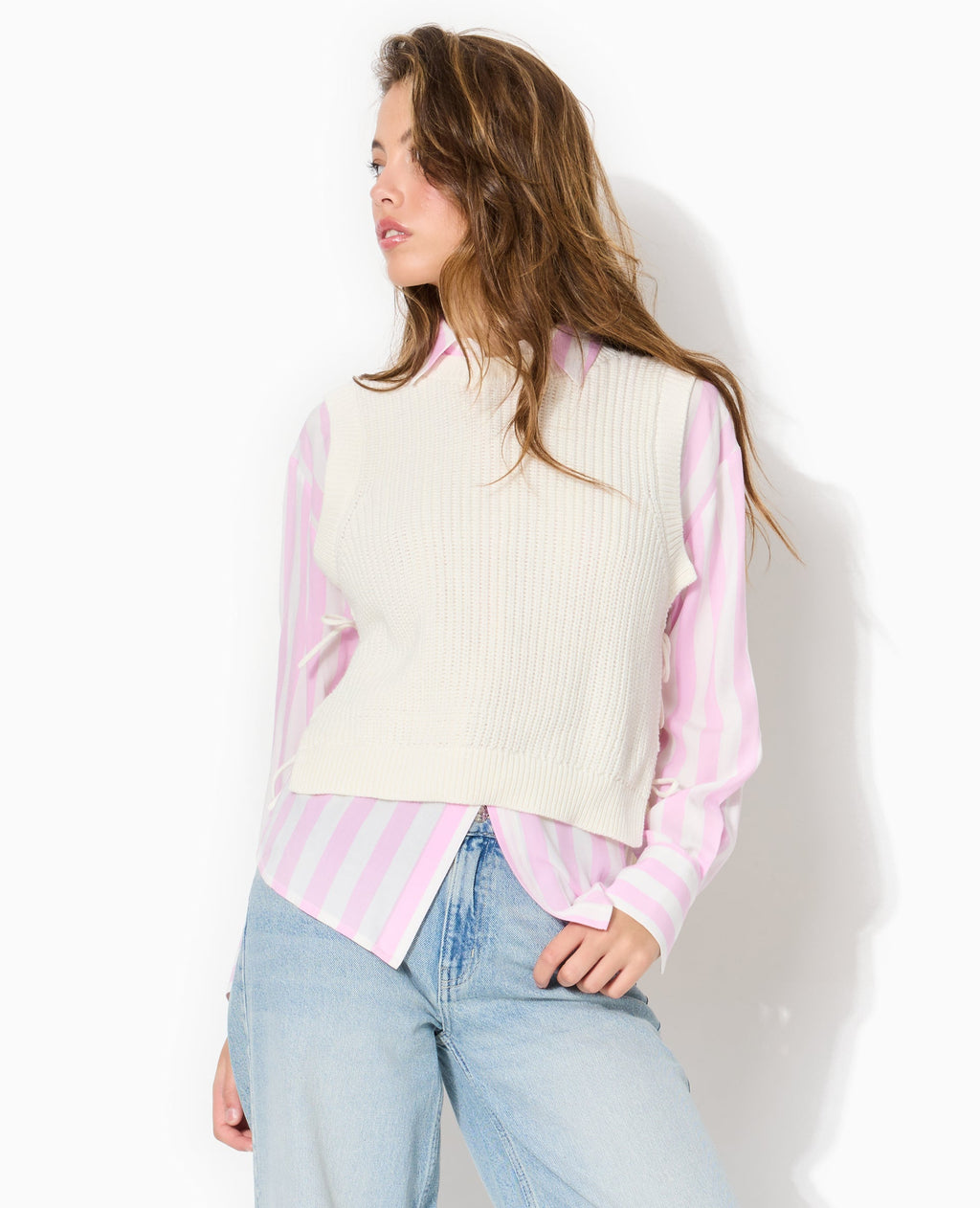 Pull sans manches avec nouettes côtés