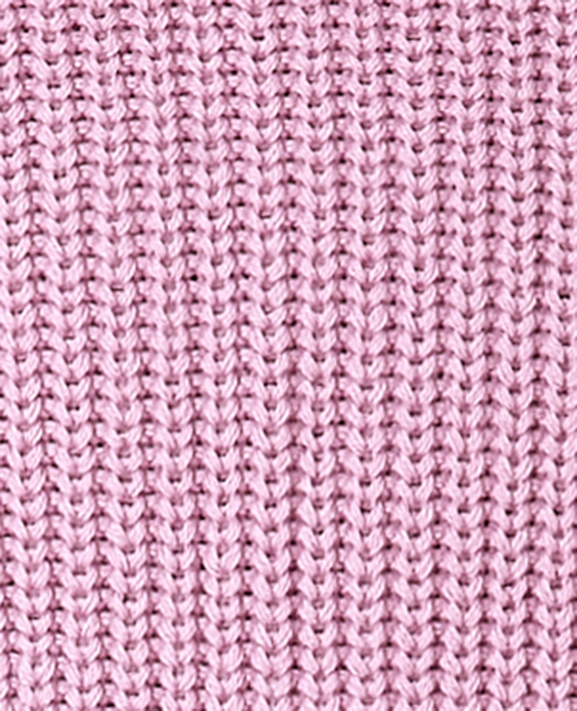 Pull sans manches avec nouettes côtés