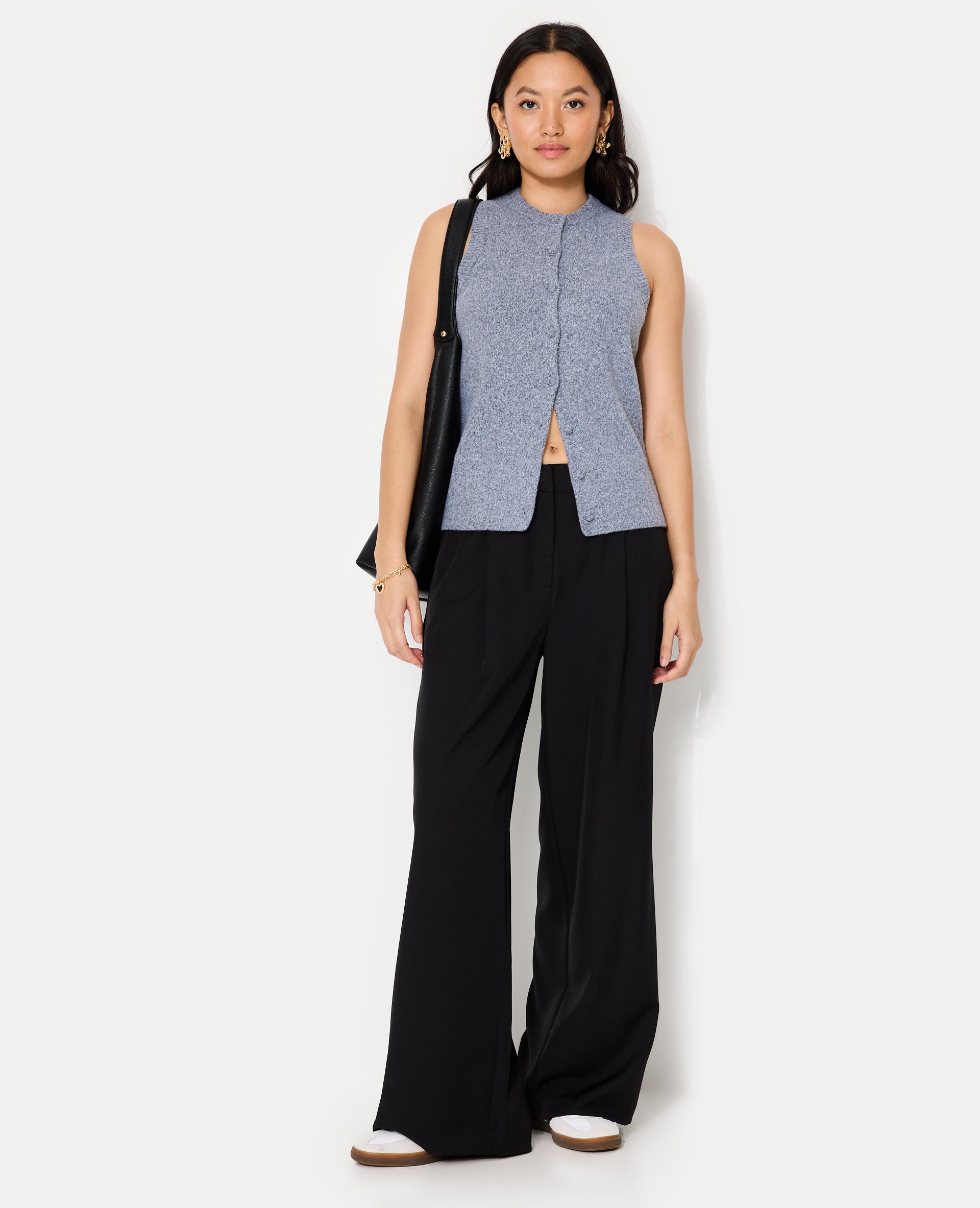 Gilet sans manches avec boutons recouverts