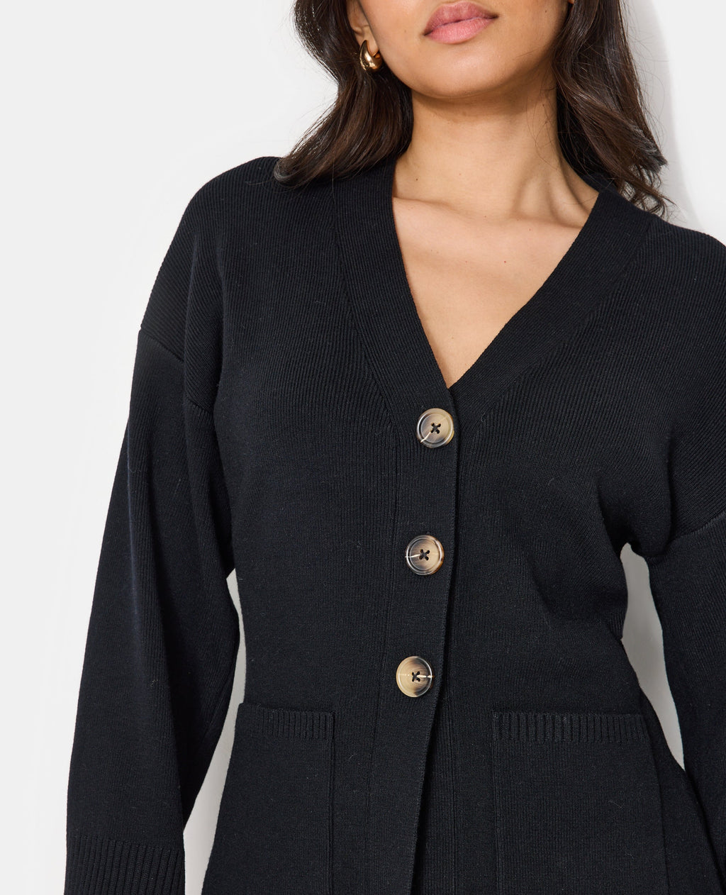 Gilet long et cintré avec poches