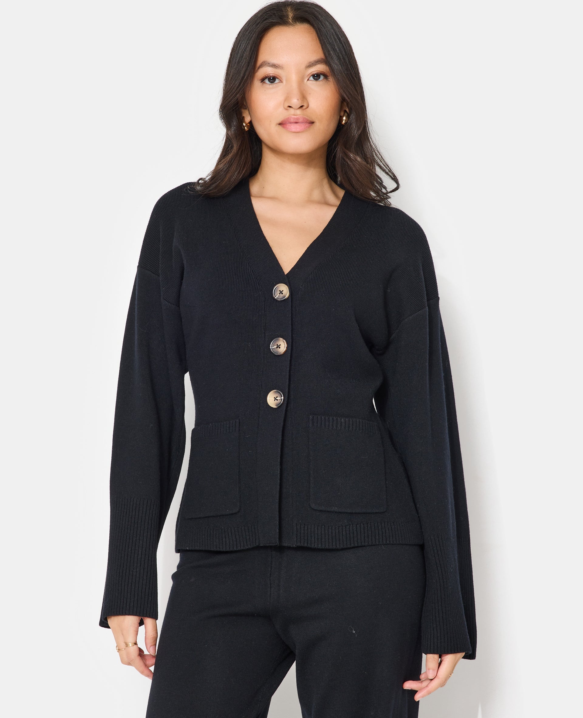 Gilet long et cintré avec poches