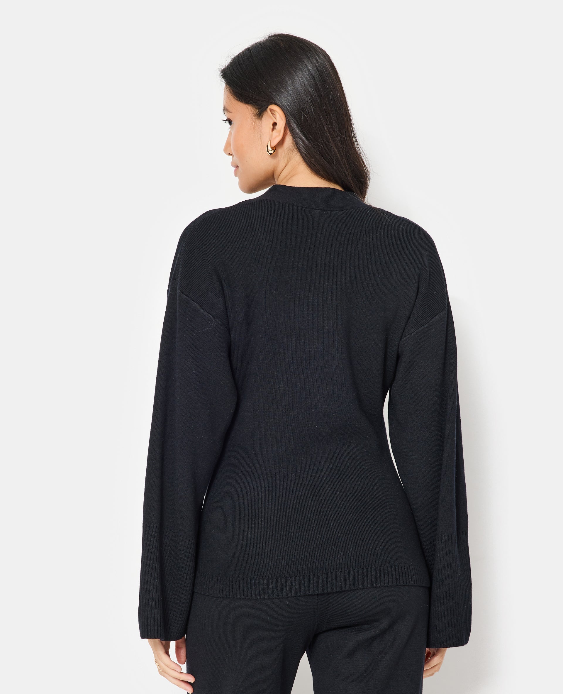 Gilet long et cintré avec poches