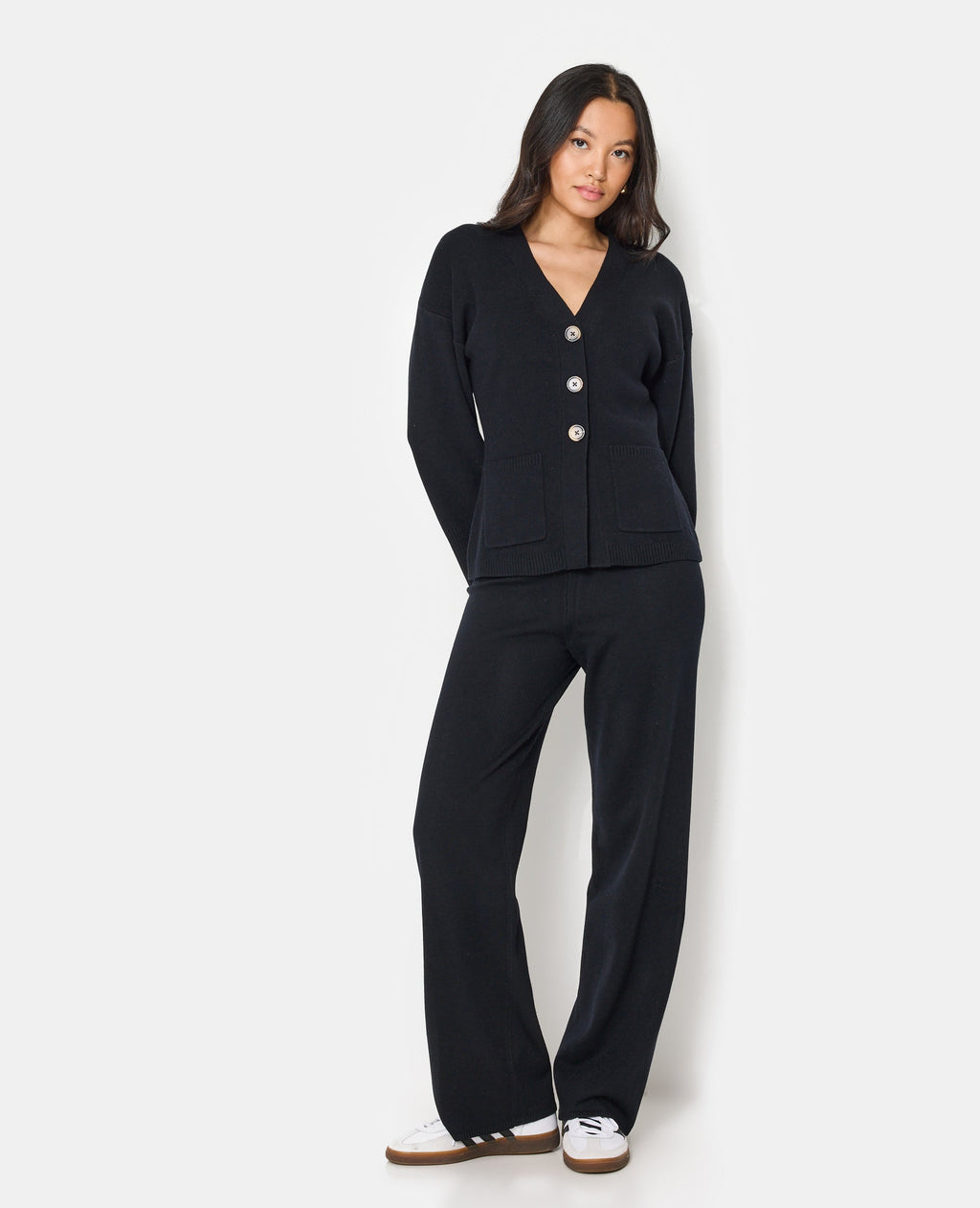 Gilet long et cintré avec poches